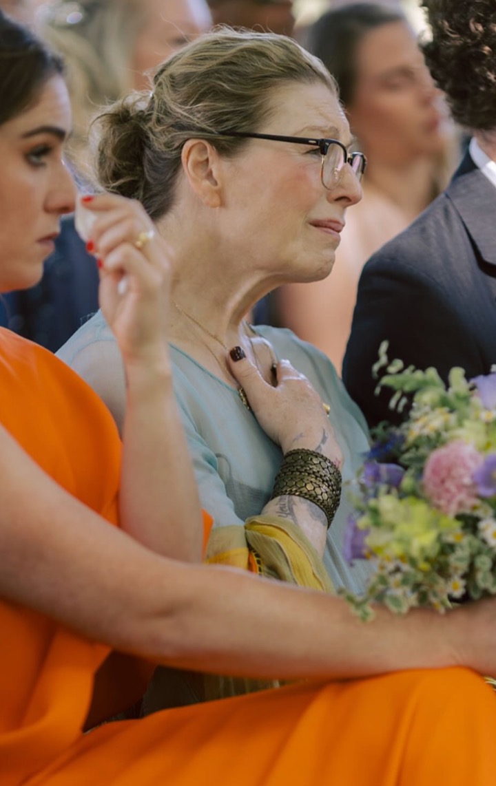Tatum O'Neal appeared emotional as she watched her eldest son, Kevin, marry Fern Cozine in June 2025. The couple exchanged personal vows beneath a 100-year-old walnut tree, surrounded by relatives from both sides of their family. | Source: Instagram/@kevinjmcenroe