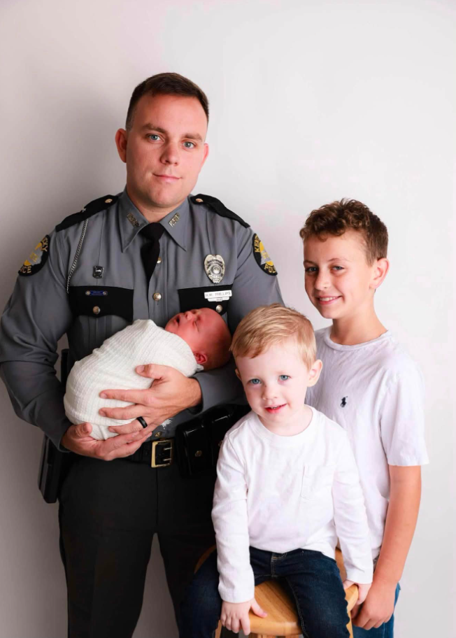 Hayden Phillips is pictured with his three young sons in a family photo shared by his wife, Jordan, as she remembered the husband and father she loved and the memories she hopes their boys will carry with them. | Source: Facebook/Jordan Phillips