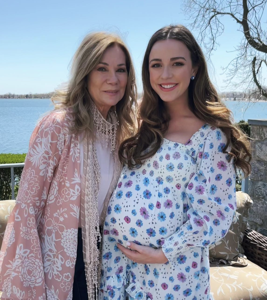Kathie Lee Gifford poses with her pregnant daughter Cassidy, who lovingly cradles her baby bump during a sweet family moment by the water — as another generation of the Gifford family prepares to arrive. | Source: Instagram @kathielgifford.