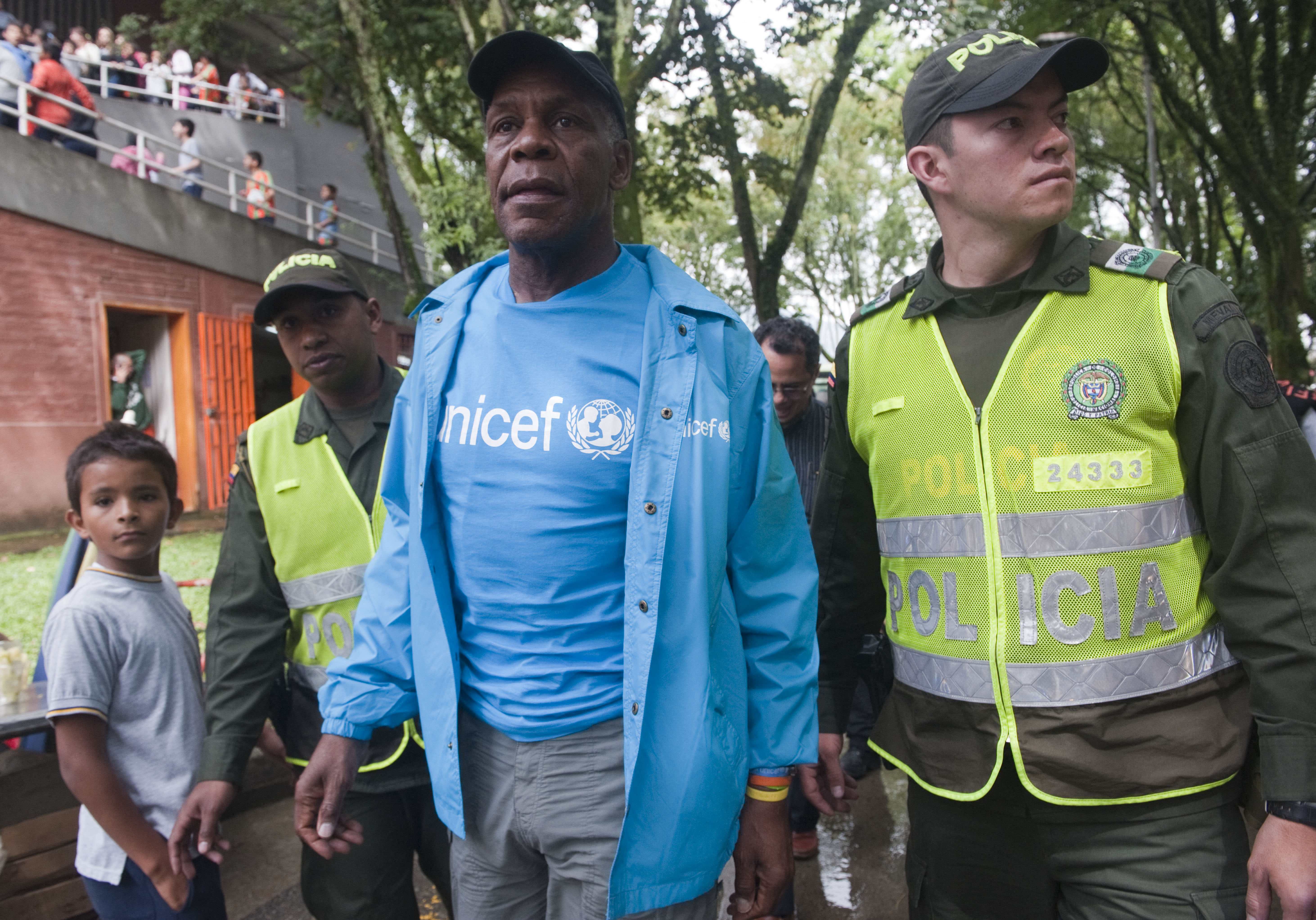 Danny Glover's humanitarian work has taken him around the world. Here, the actor and longtime UNICEF Goodwill Ambassador visits children during one of his advocacy trips, reflecting the lifelong commitment to justice and public service that has defined his career beyond Hollywood. | Source: Getty Images