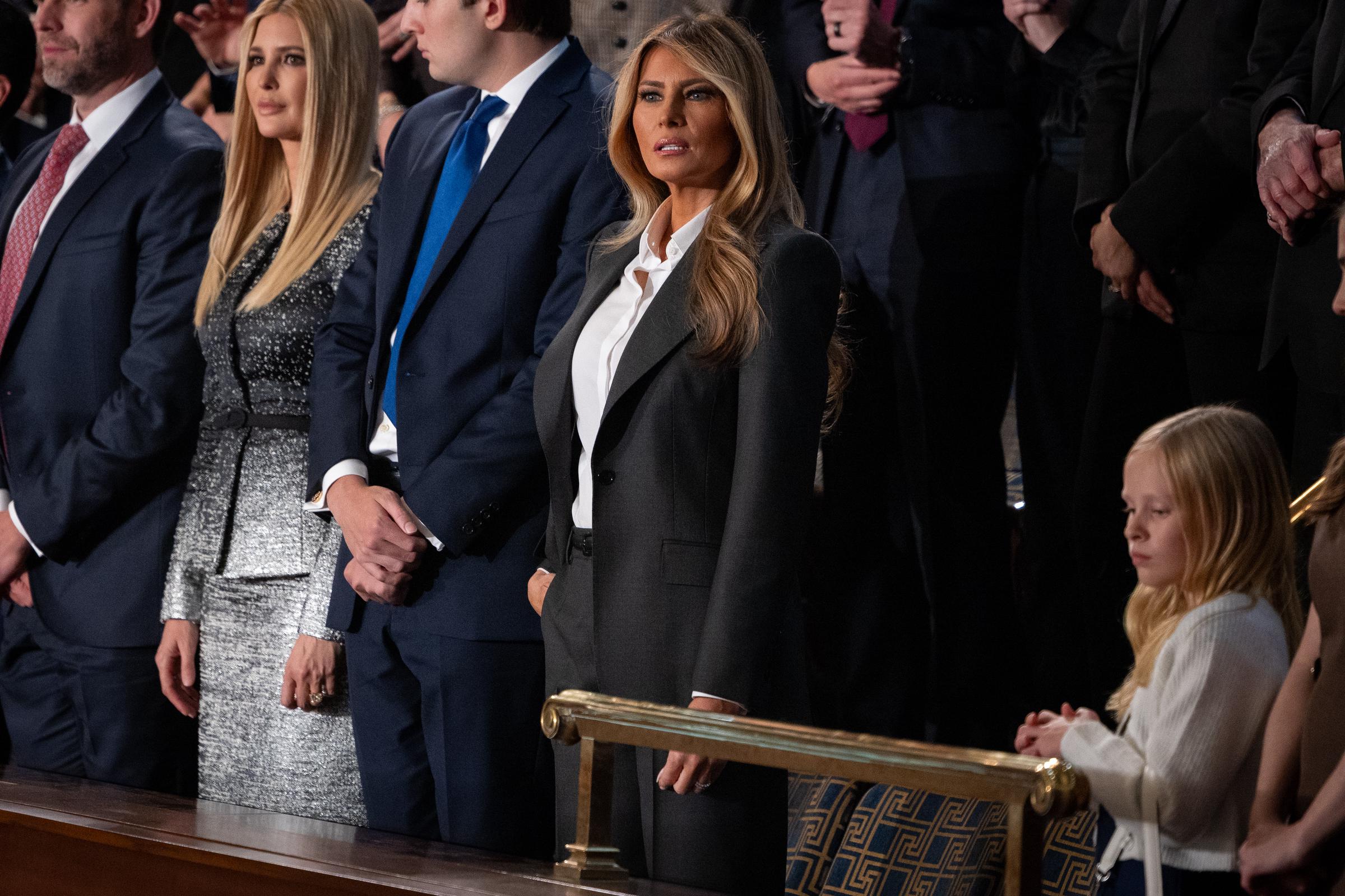 First Lady Melania Trump and the rest of the Trump family are seen inside the chambers of the U.S. House of Representatives ahead of President Trump's State of the Union address in Washington, DC on February 24, 2026. | Source: Getty Images