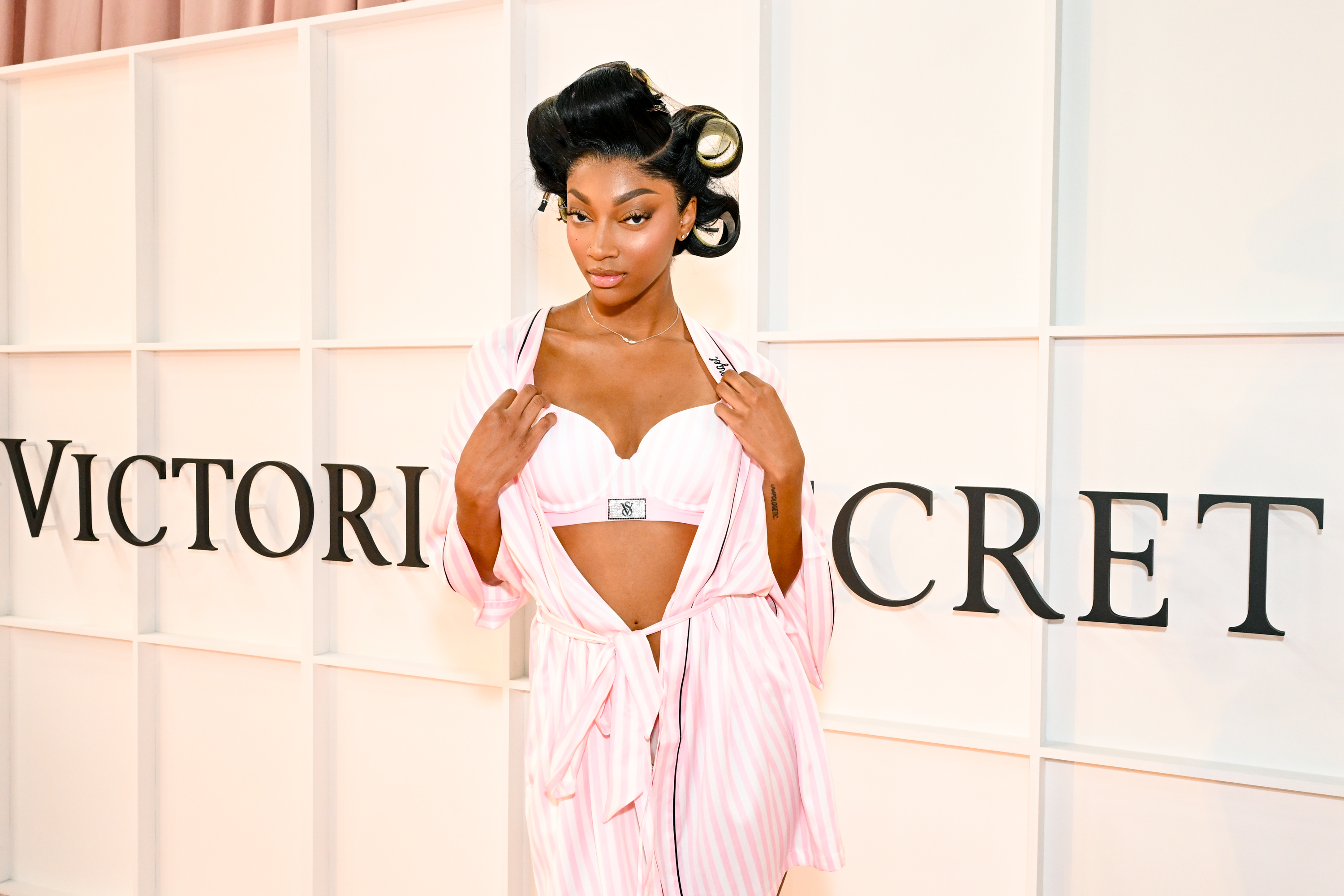 Angel Reese prepares backstage before the Victoria's Secret Fashion Show at Steiner Studios on October 15, 2025 in New York City | Source: Getty Images