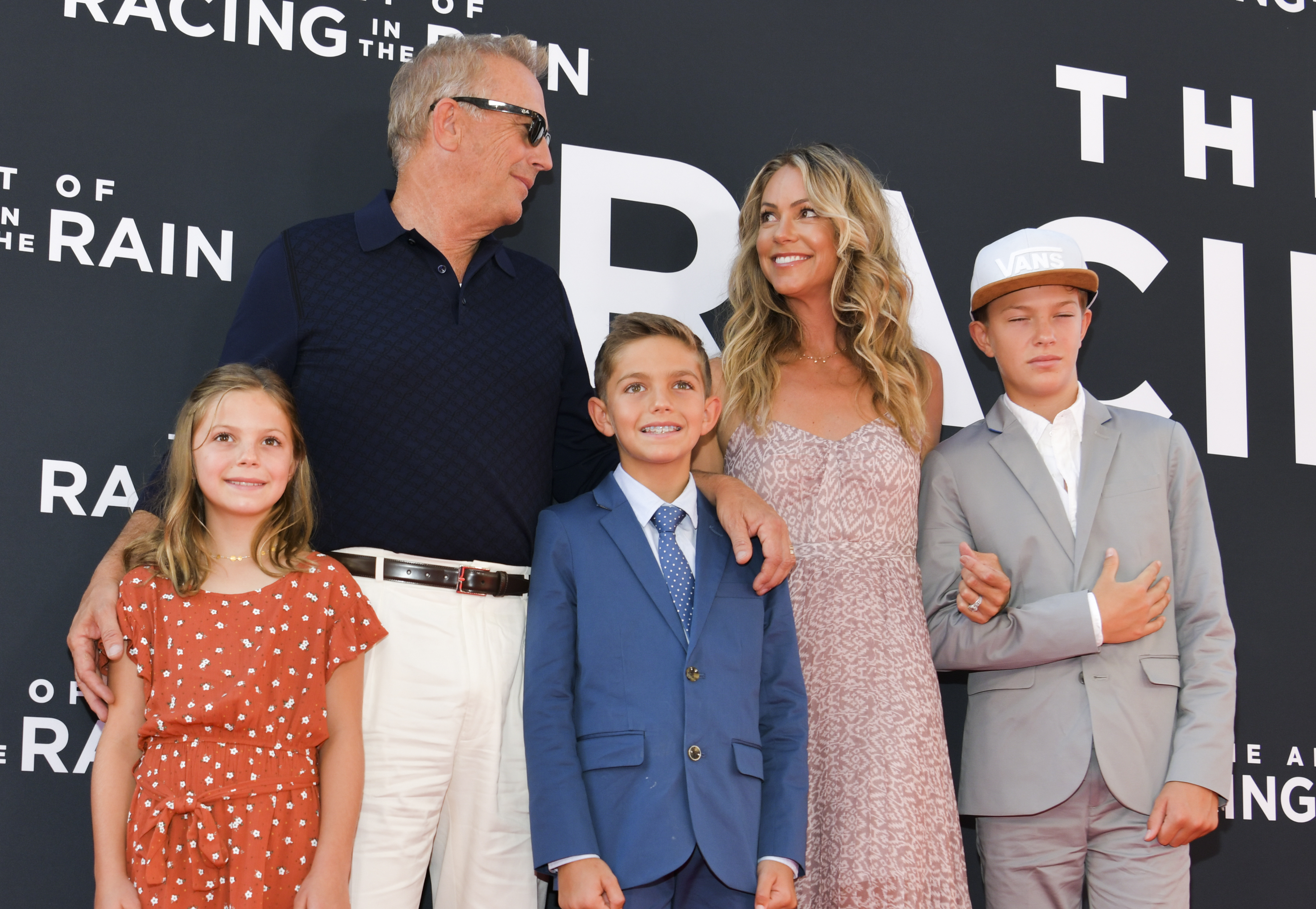 Kevin Costner and Christine Baumgartner with their kids, Grace, Hayes, and Cayden Costner at the premiere of "The Art of Racing in the Rain" in Los Angeles, California on August 1, 2019. | Source: Getty Images