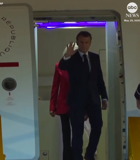 Emmanuel Macron waving to people as Brigitte Macron stands behind him. | Source: Instagram/abcnews