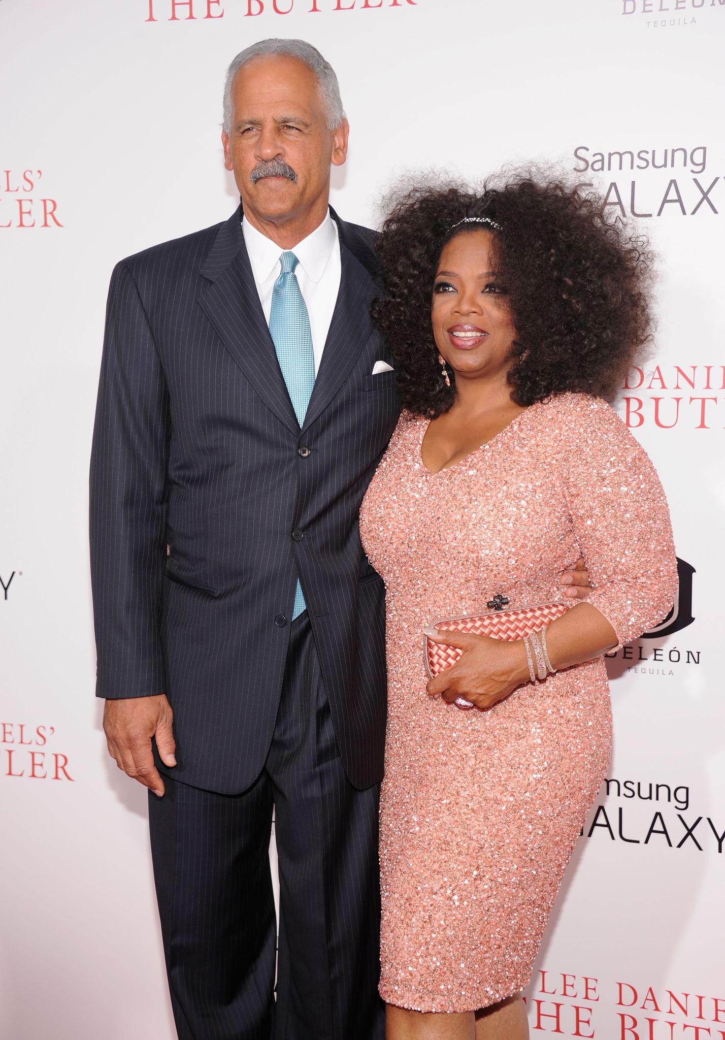 Stedman Graham and Oprah Winfrey arrive on the red carpet for the premiere of "The Butler" on August 5, 2013 | Photo: Getty Images