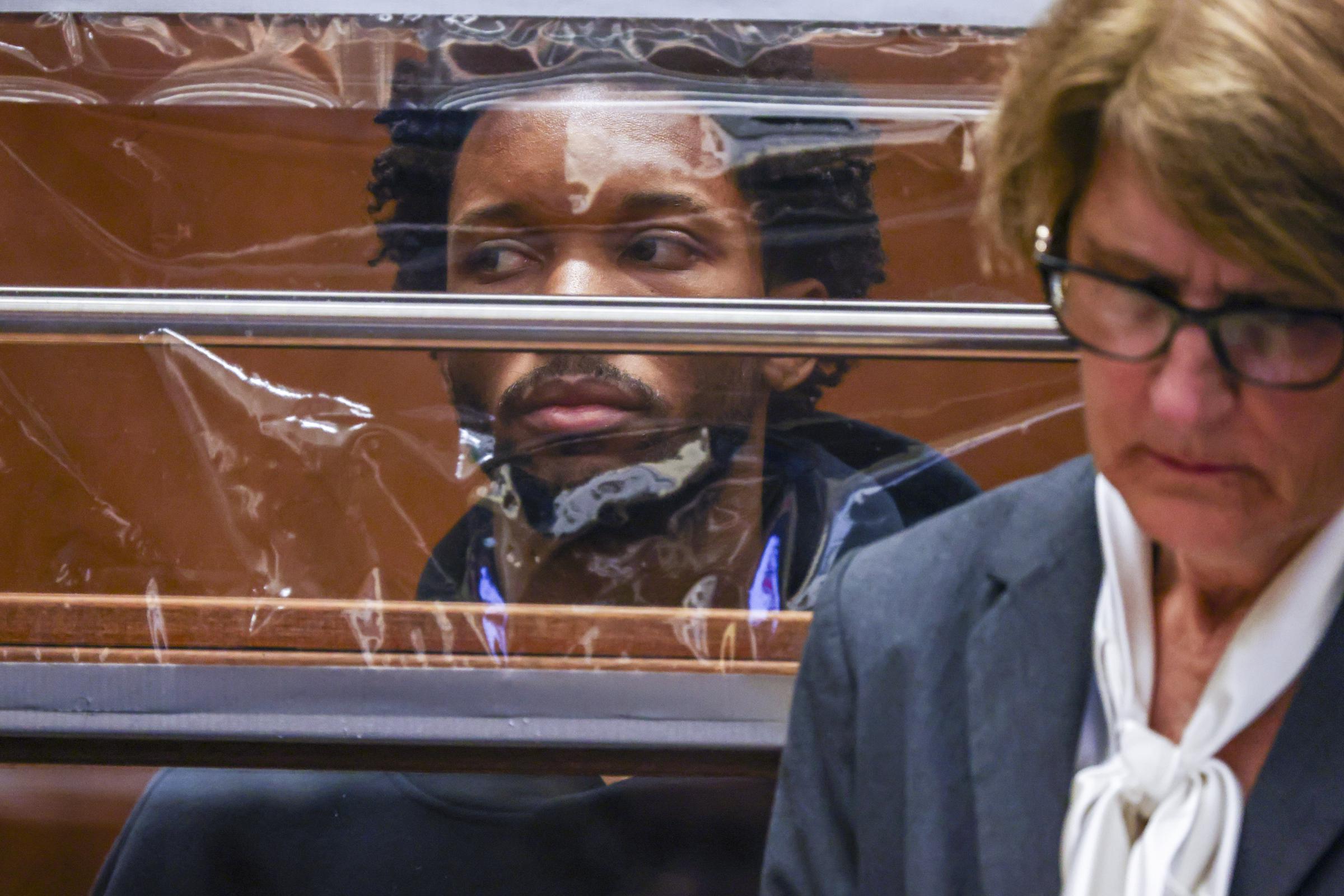 D4vd looks on from behind his defense attorney Marilyn Bednarski (R) during his arraignment at Clara Shortridge Foltz Criminal Justice Center in Los Angeles, California on April 20, 2026. | Source: Getty Images