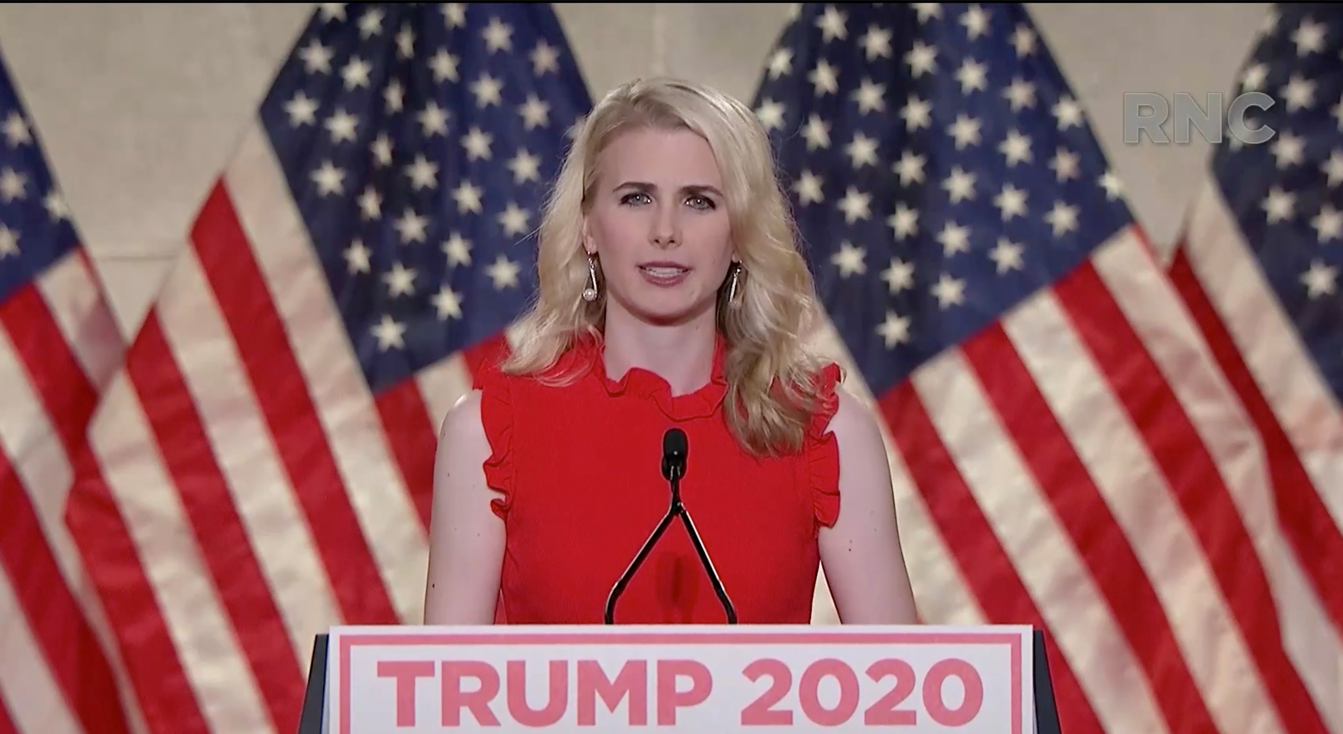 Natalie Harp's public connection to Donald Trump reportedly traces back to a dramatic 2020 convention speech, where she credited him with helping save her life. That origin story later became a key backdrop to reports about her unusually devoted role in his inner circle. | Source: Getty Images