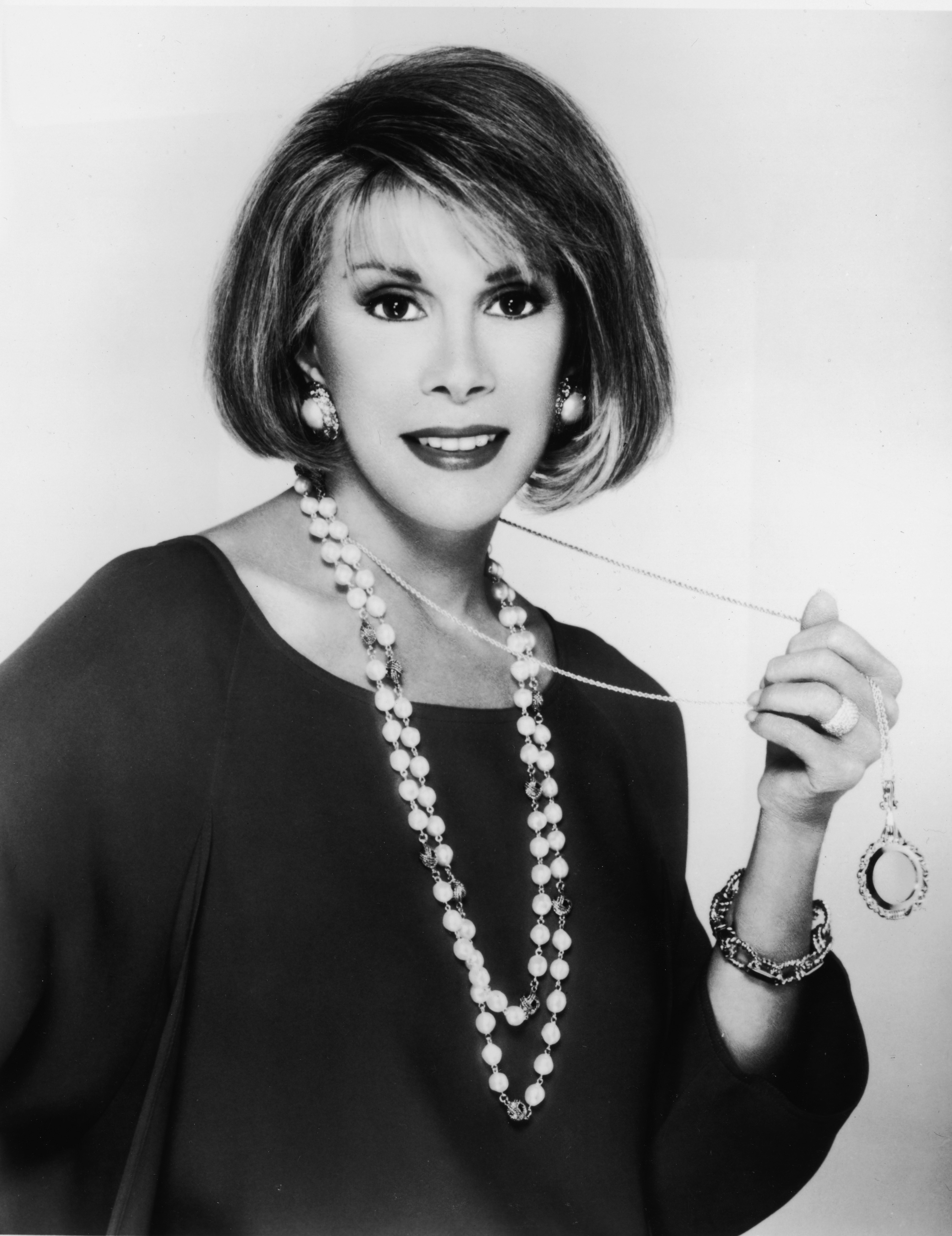 Joan Rivers poses for a promotional portrait in the 1980s, when she was already an established presence in American comedy and television. | Source: Getty Images