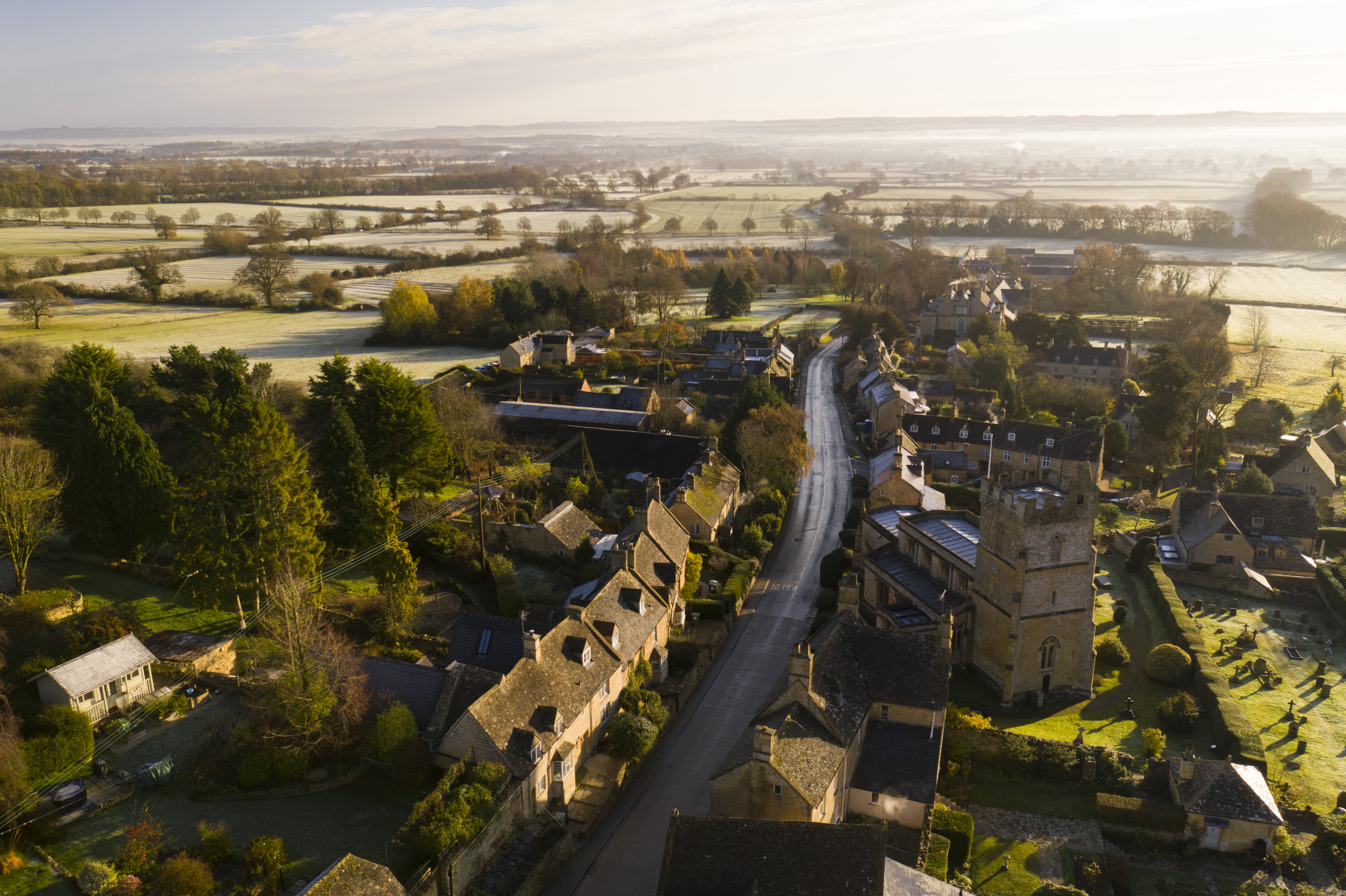 An aerial view shows Bourton-on-the-Hill in the Cotswolds, where Harry and Meghan were reportedly searching for a permanent home after their return. Their priorities were said to include privacy, extensive land, and enough space for their family's needs. | Source: Getty Images