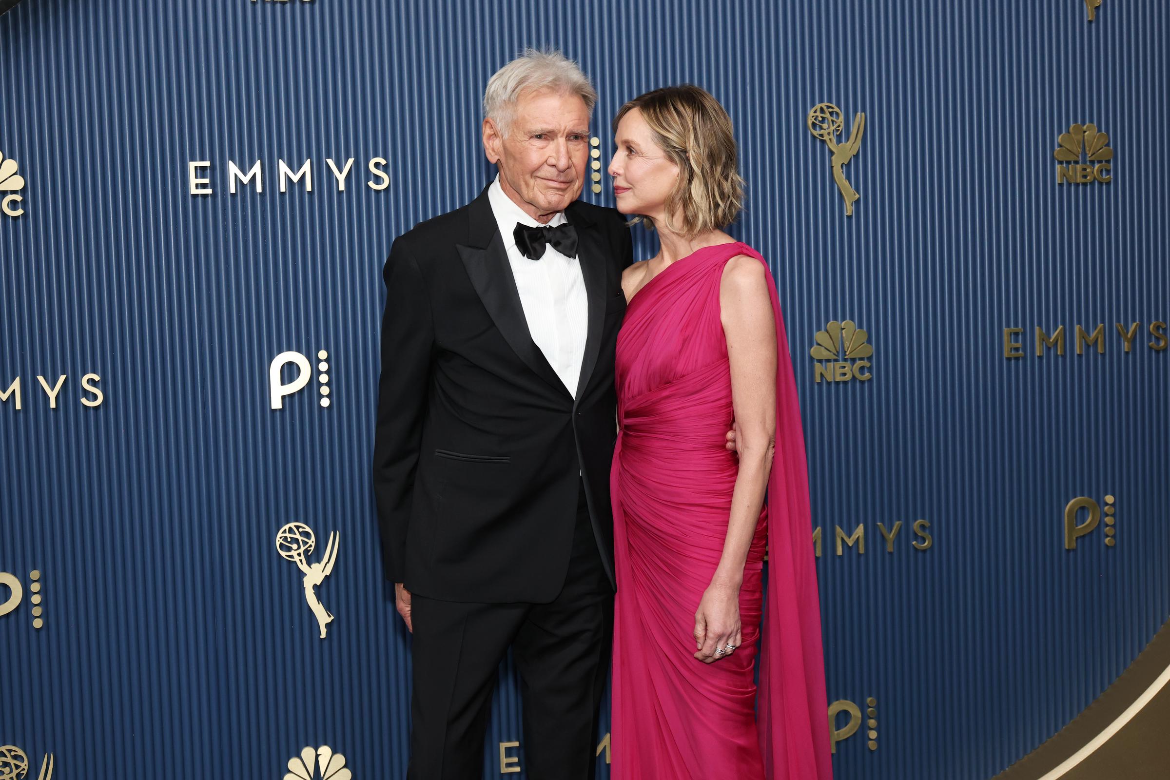 Flockhart looks toward Ford as the couple stands close together for photographers. Their coordinated formal appearance drew praise from some social media users after images from the evening circulated online.