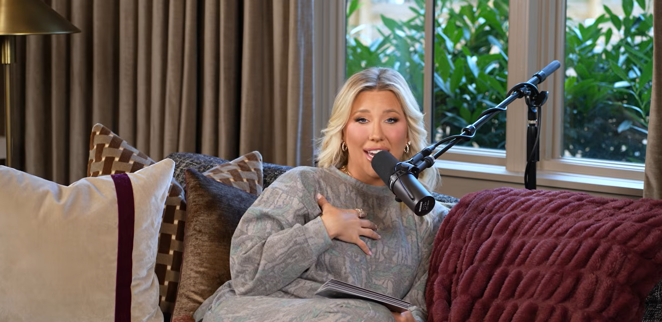 Savannah gestures during her podcast as she recalls the unexpected proposal and the moment Jason presented the ring. | Source: Youtube/SavannahChrisleyOfficial