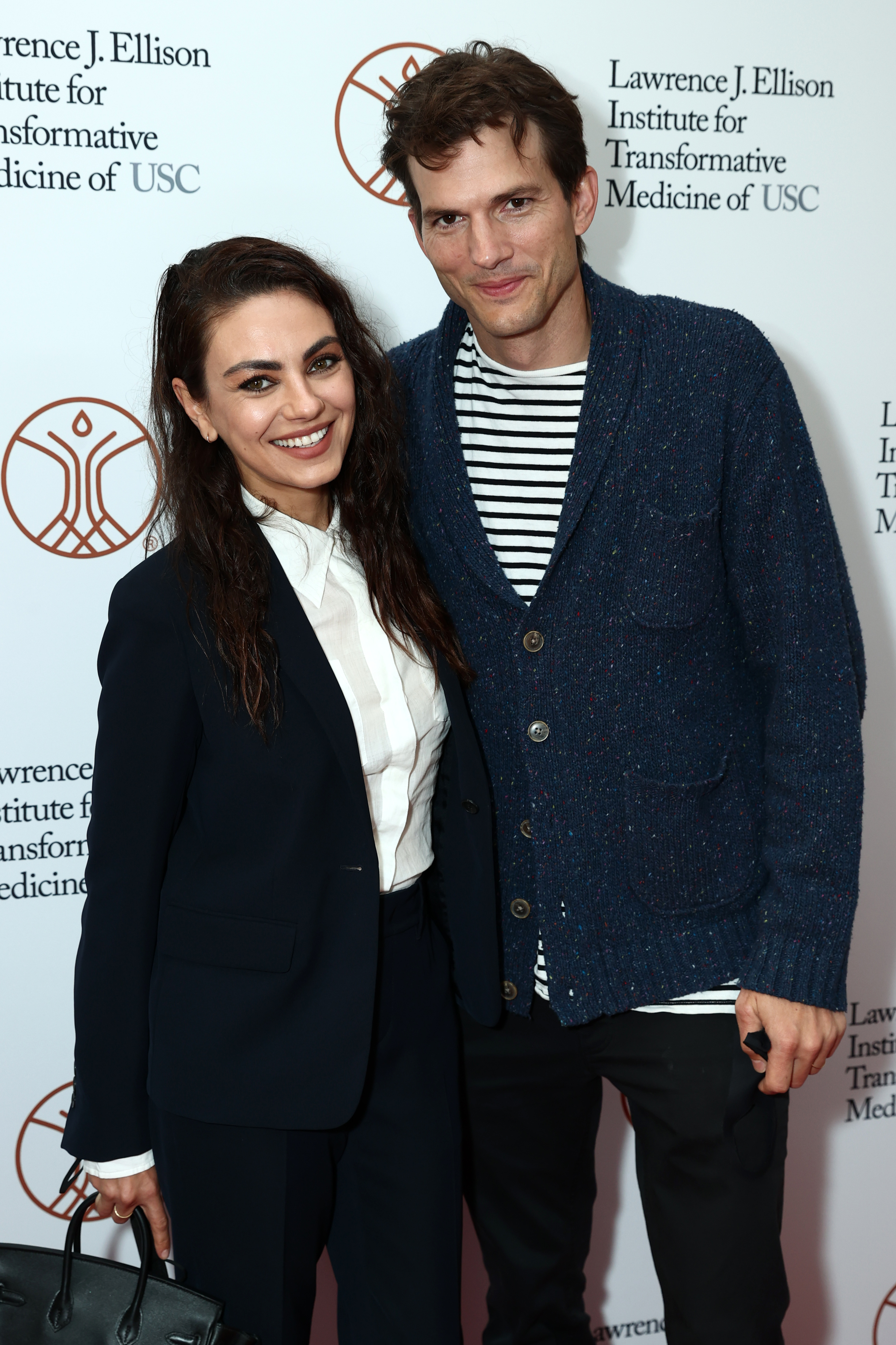 Mila Kunis and Ashton Kutcher at the grand opening of the Lawrence J. Ellison Institute on September 28, 2021, in Los Angeles, California. | Source: Getty Images