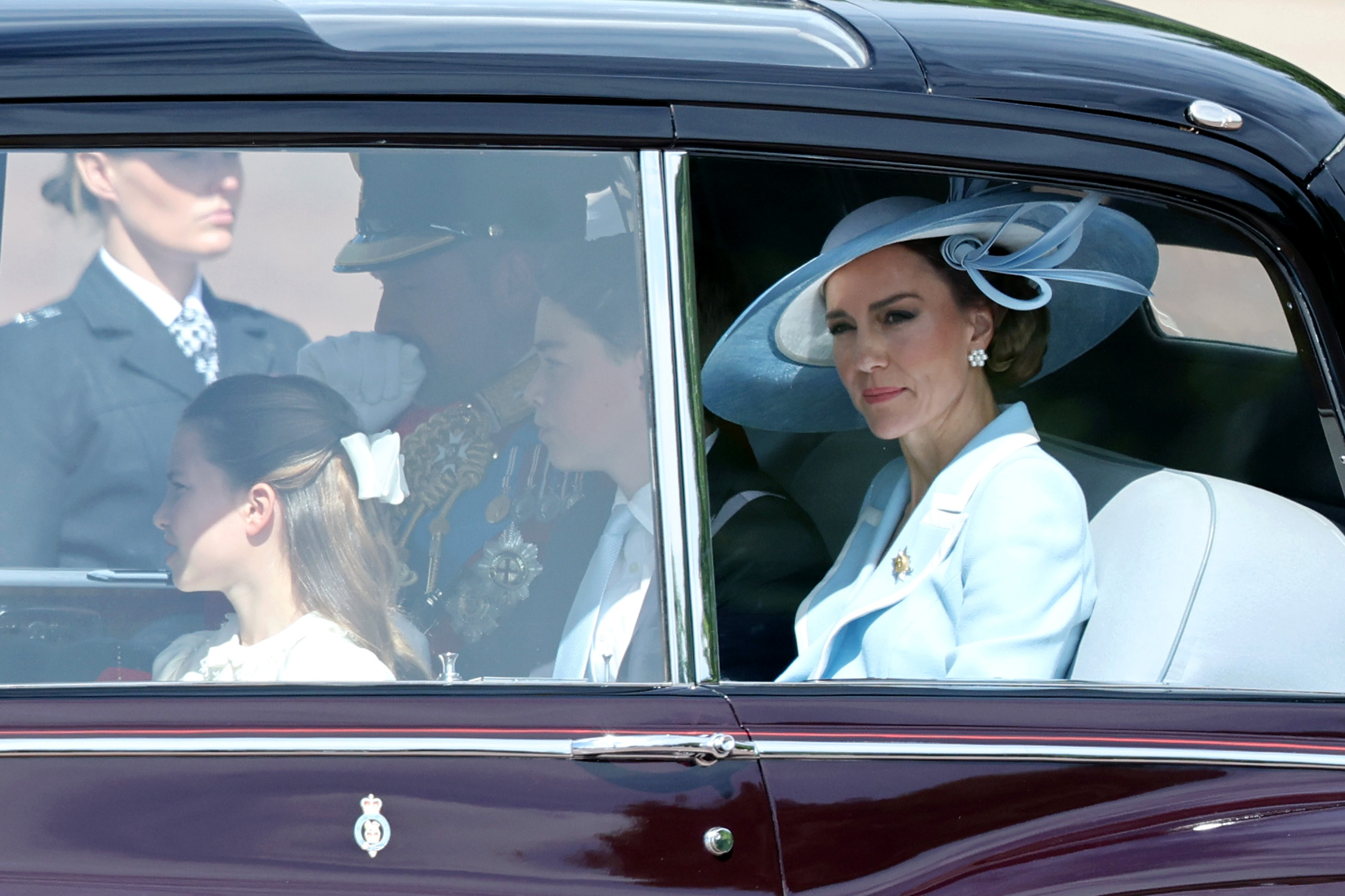 The royal children were seen in the car along with their parents. In this photo, there's Princess Charlotte of Wales, Prince William, Prince of Wales, and Prince George of Wales riding in a car toward Trooping the Colour at Buckingham Palace on June 13, 2026, in London, England. | Source: Getty Images