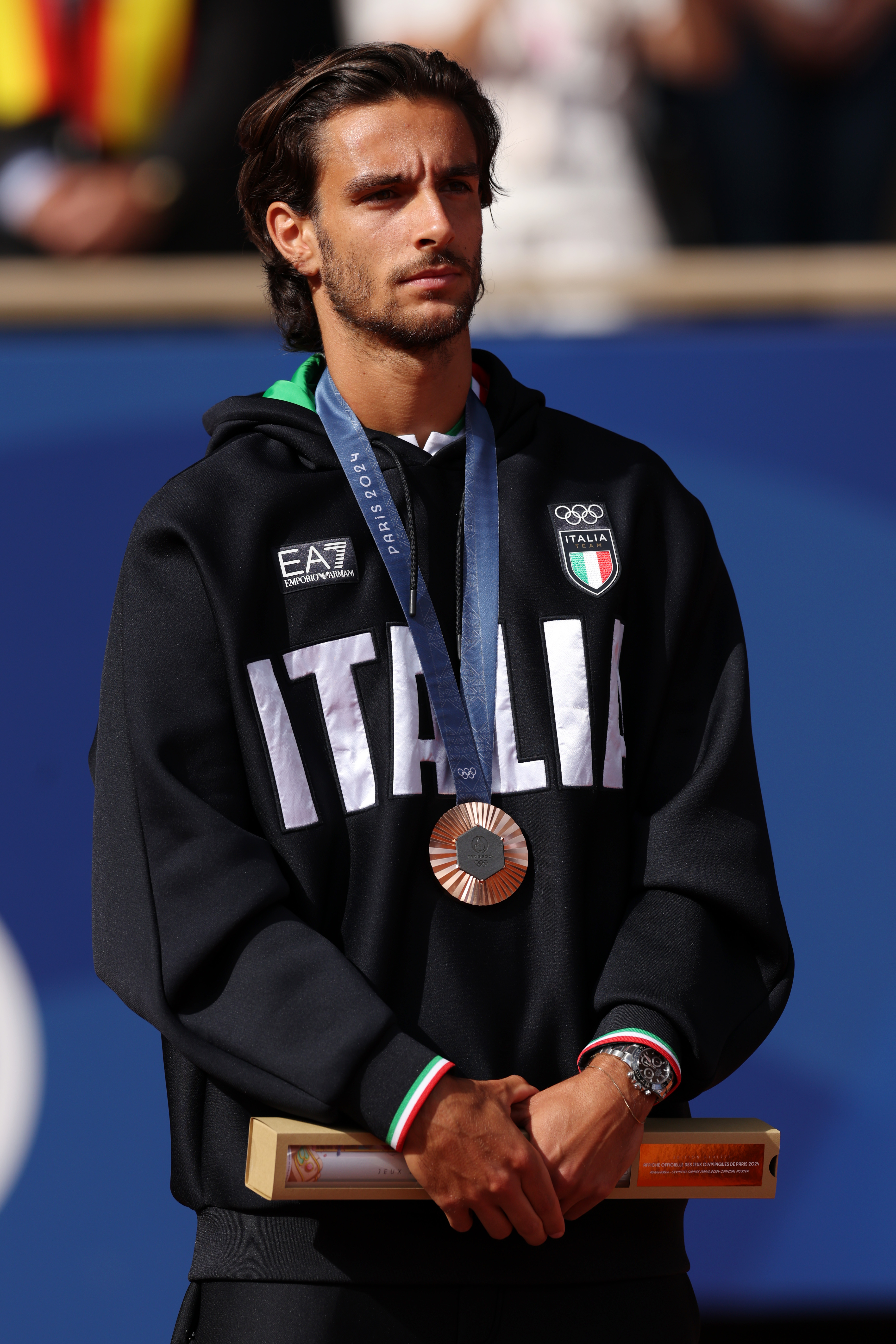 The Italian won bronze at Roland Garros during the Paris Olympics in 2024. The medal was one of the biggest results of his career before Milan gave him a first taste of a very different kind of runway. | Source: Getty Images