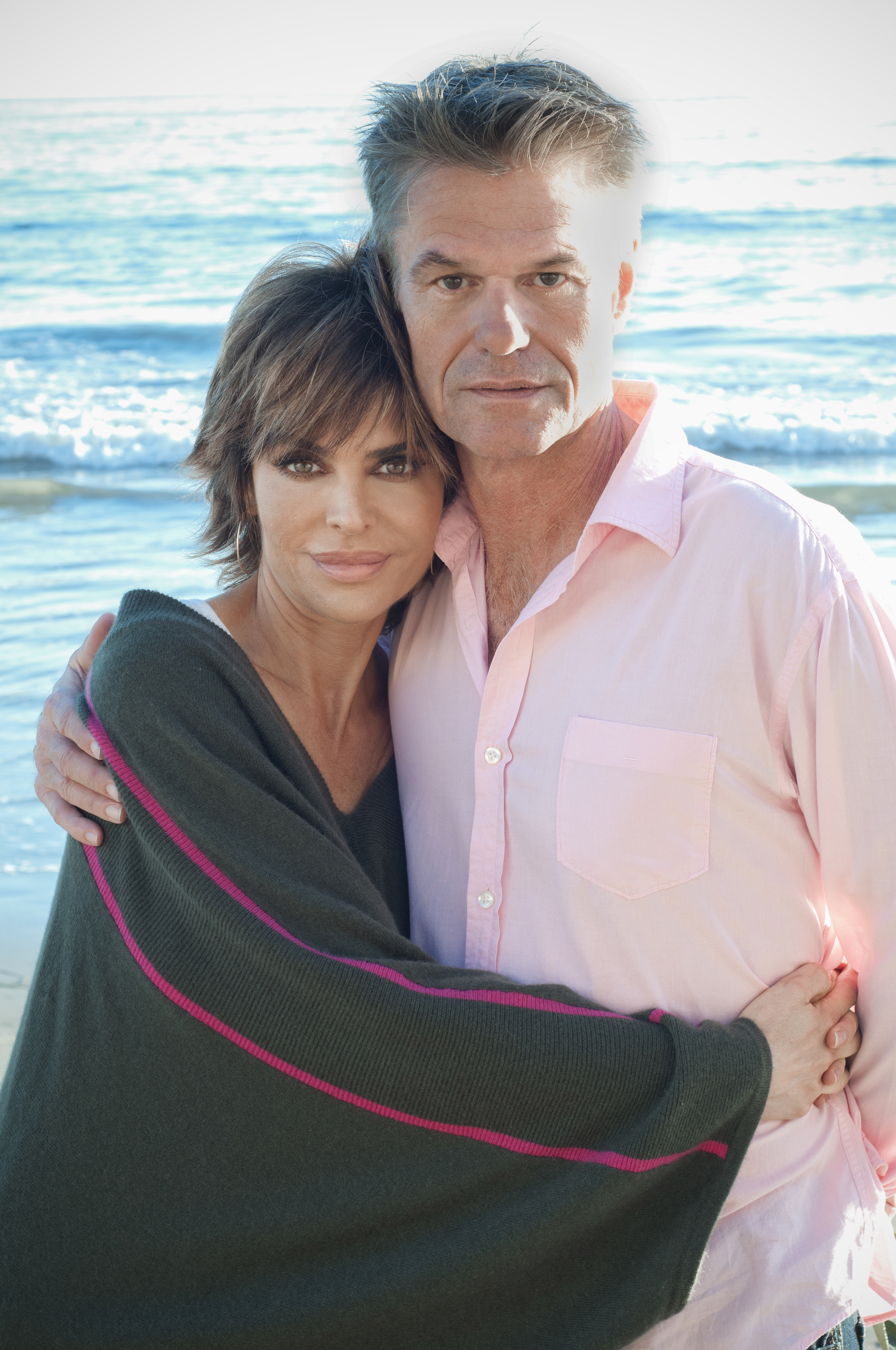 Lisa Rinna and Harry Hamlin posing on the beach in Malibu, California on January 7, 2013. | Source: Getty Images
