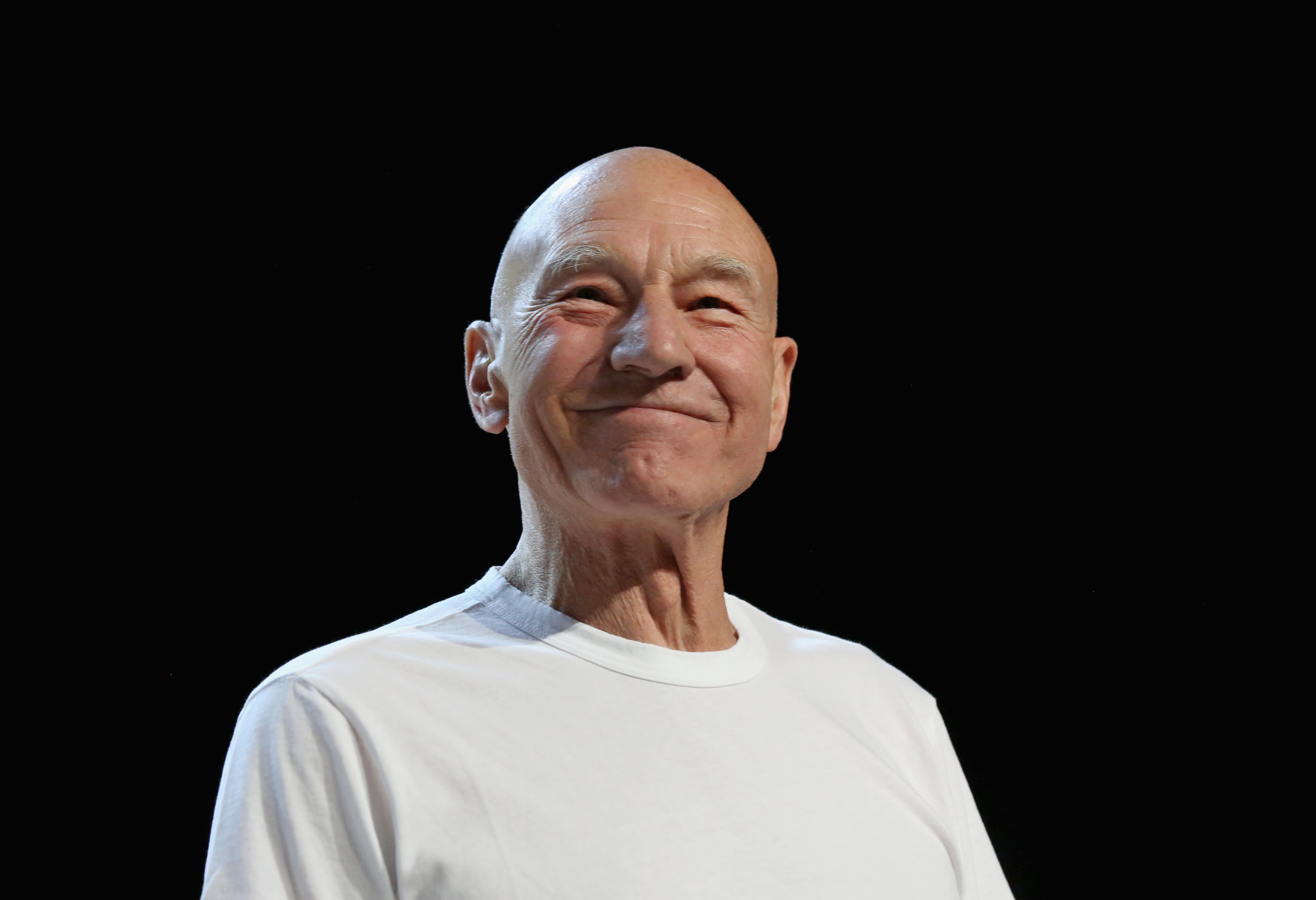 Patrick Stewart smiles during a "Star Trek" convention in Las Vegas in August 2018. Years later, a more personal photograph shared by his wife, Sunny Ozell, would become a place for fans to leave heartfelt messages. | Source: Getty Images