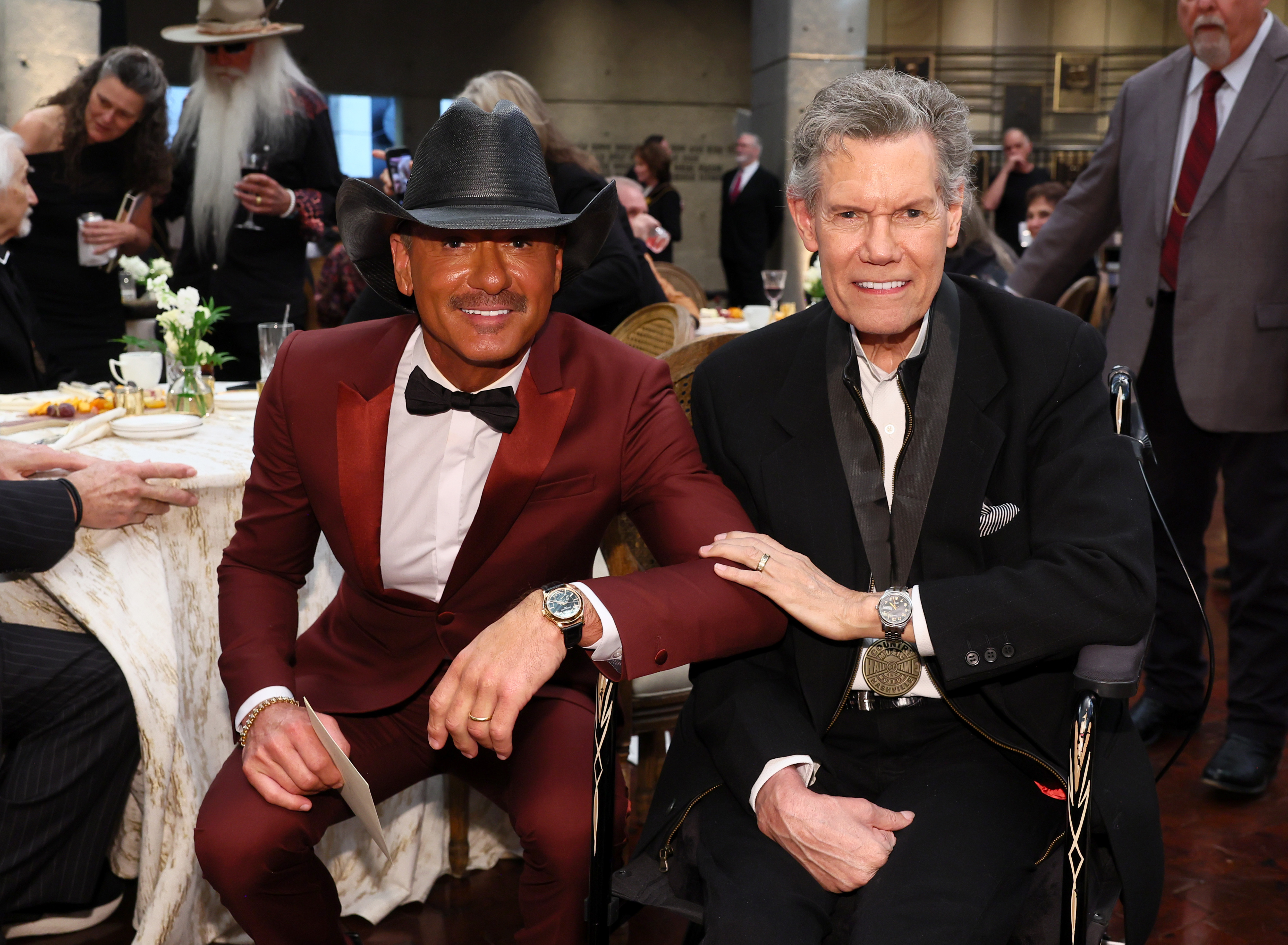 Tim McGraw poses alongside fellow country music star Randy Travis at the Country Music Hall of Fame and Museum’s 2026 Medallion Ceremony in Nashville, Tennessee, on October 18, 2026. | Source: Getty Images
