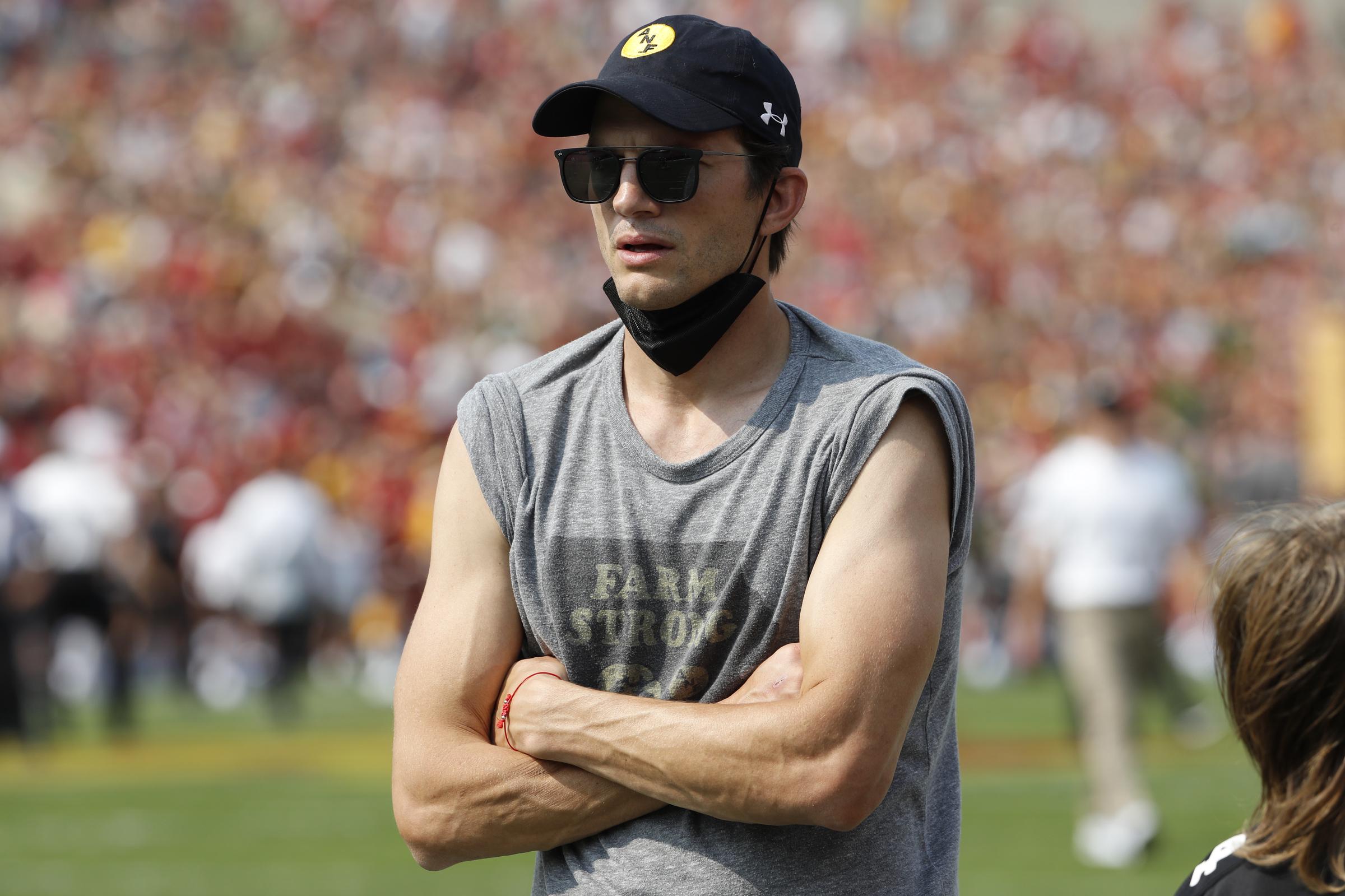 Ashton Kutcher watches pregame warmups of the Iowa Hawkeyes and Iowa State Cyclones at Jack Trice Stadium in Ames, Iowa, on September 11, 2021. | Source: Getty Images