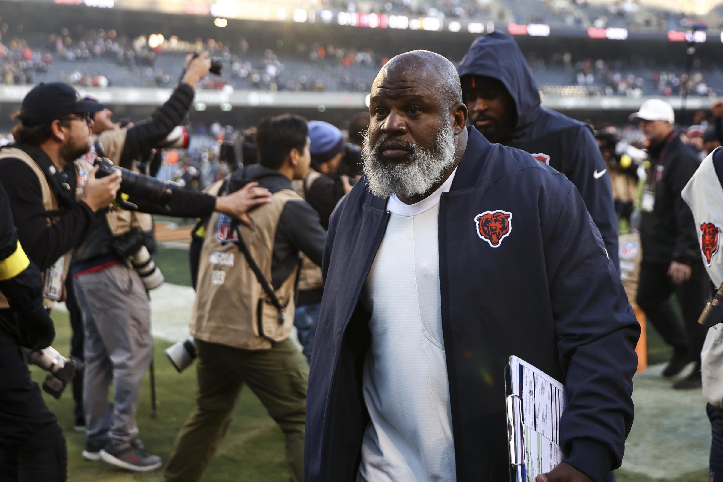 Eric Bieniemy walks off the field after a Chicago Bears game during the 2025 NFL season. Months later, he returned to Kansas City before stepping away from the Chiefs' training camp following the shooting involving his family. | Source: Getty Images