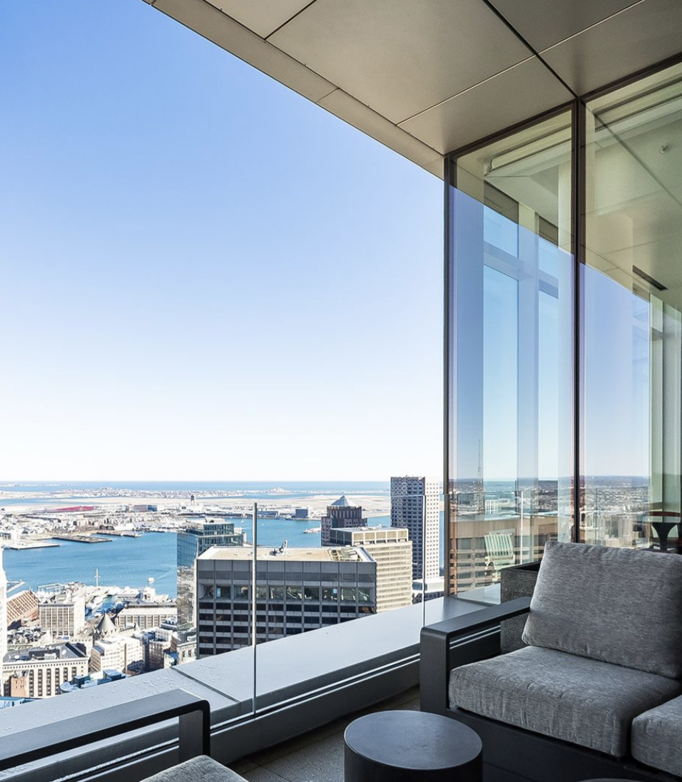 The penthouse's private terrace offers sweeping views of Boston Harbor, high above the city's busy streets. | Source: Instagram/@robbreport