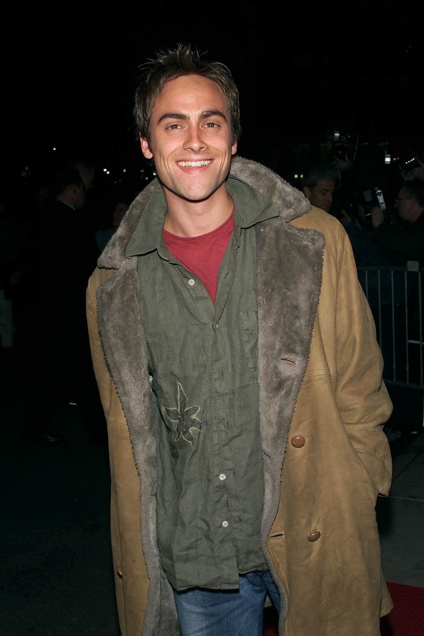 Stuart Townsend arrived at a screening of "About Adam" at the Paris Theater in New York City on March 20, 2001, smiling for cameras outside the event in a fur-lined tan coat layered over a green shirt. The appearance came during a period when his film career was moving forward independently of "The Lord of the Rings," following his earlier departure from the role of Aragorn after months of preparation in New Zealand.