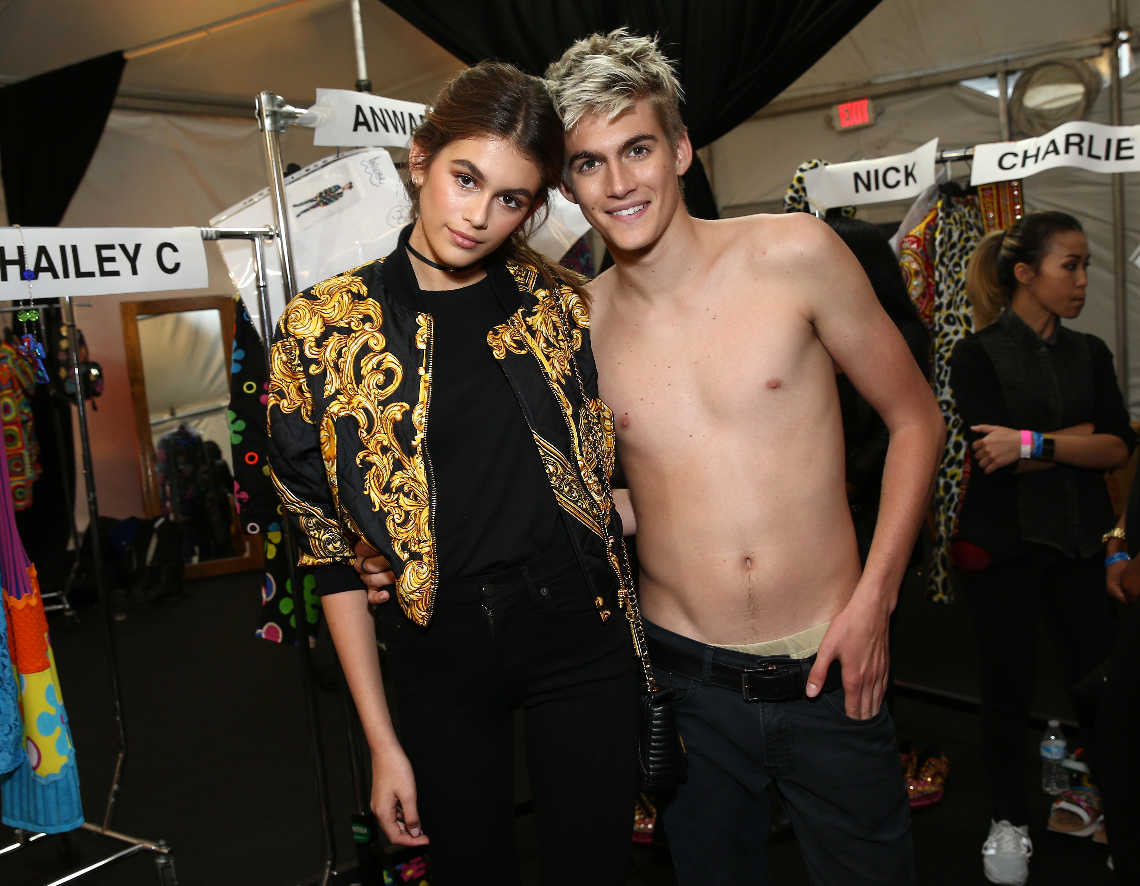 Kaia Gerber and her brother Presley Gerber pose backstage at the Moschino Men’s Spring/Summer and Women’s Resort show in Los Angeles on June 10, 2016, early in the siblings’ modeling careers. | Source: Getty Images