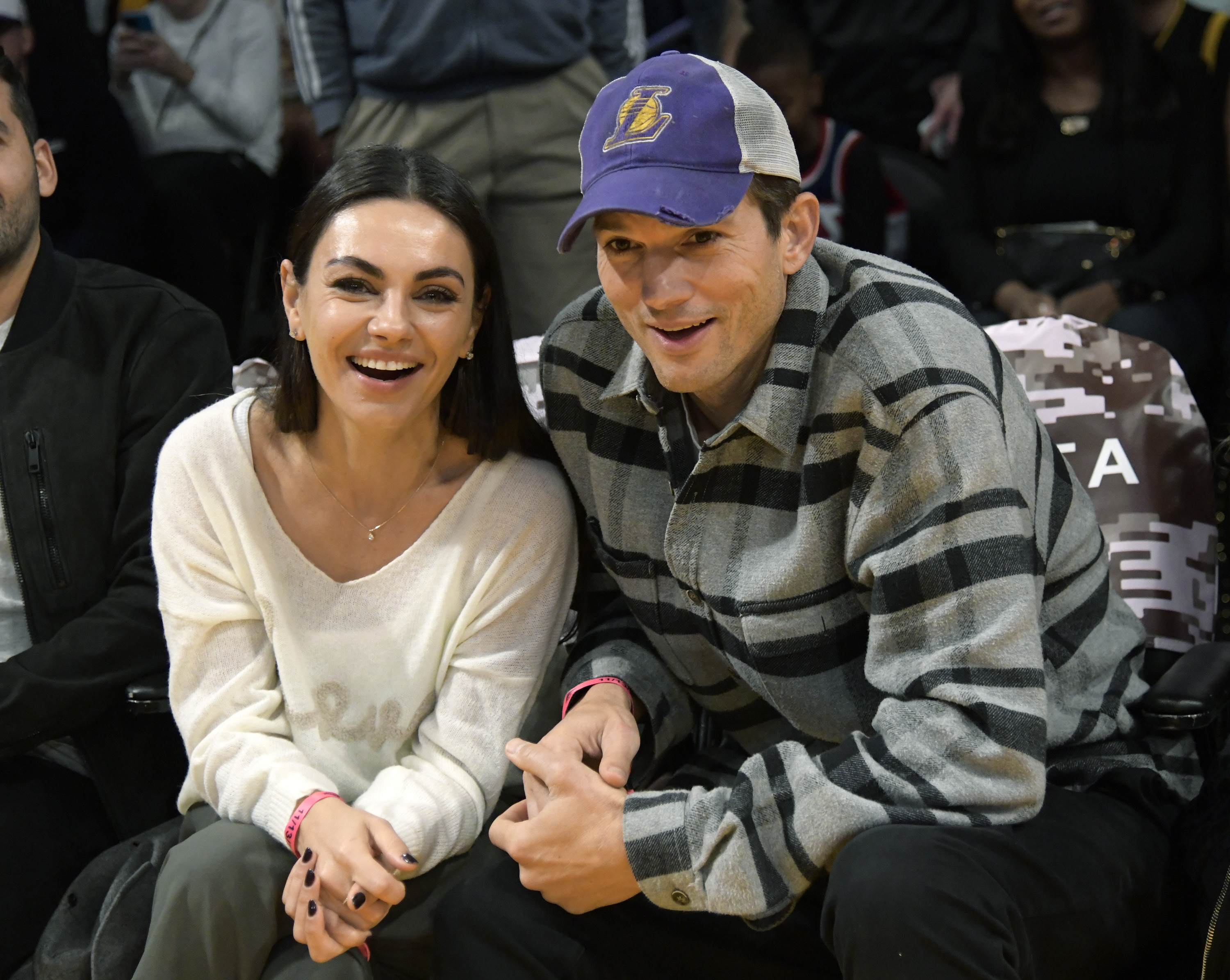 Mila Kunis and Ashton Kutcher at a basketball game between the Los Angeles Lakers and the Brooklyn Nets at Crypto.com Arena on November 13, 2022, in Los Angeles, California. | Source: Getty Images