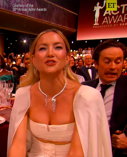 Kate Hudson speaking on her "I Am An Actor" story as Oliver Hudson makes playful and animated expressions behind her, posted on March 1, 2026. | Source: Instagram/entertainmenttonight