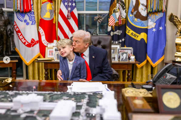 U.S. President Donald Trump planting a kiss on his grandson's head, posted on December 19, 2025. | Source: Instagram/laraleatrump