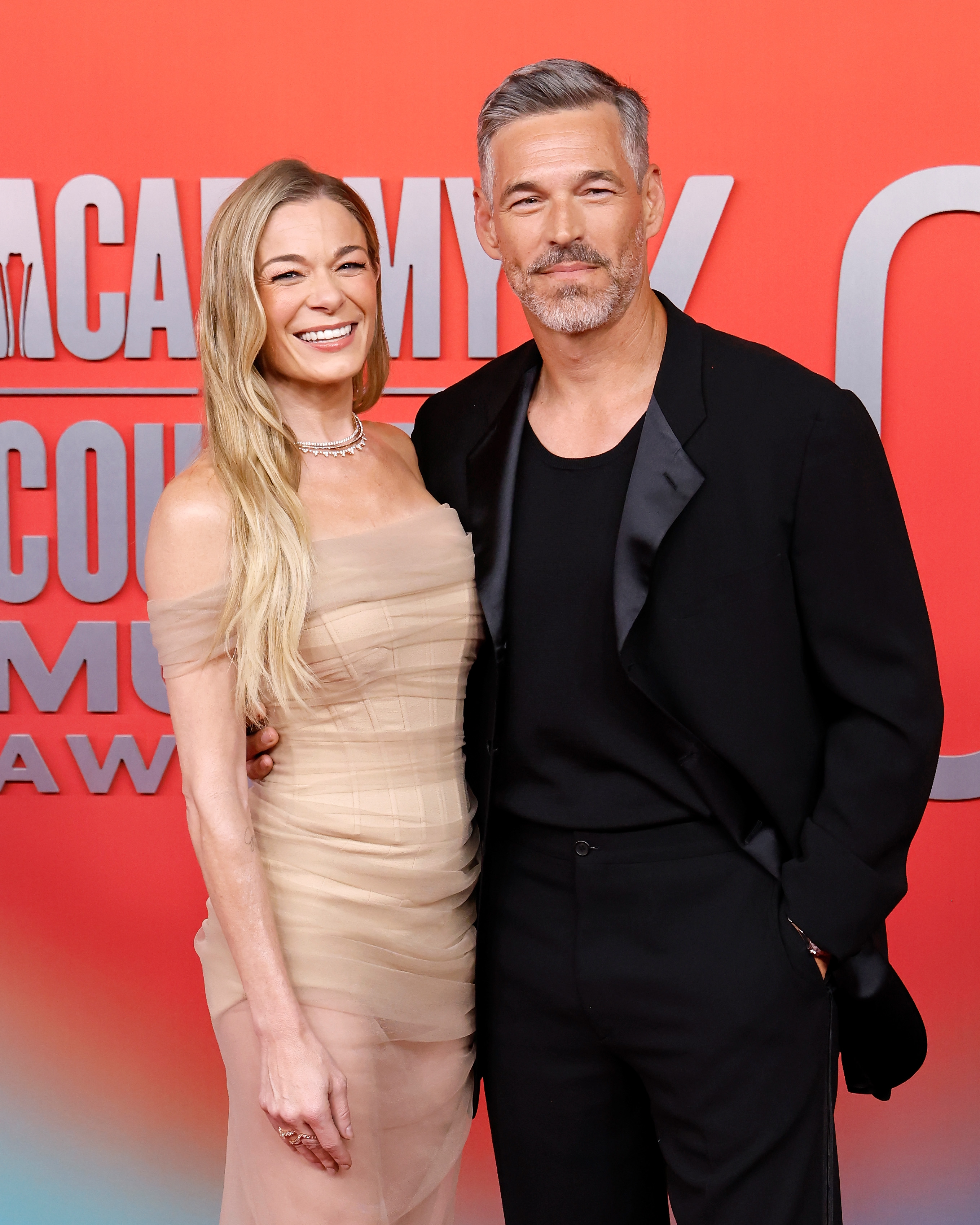 Leann Rimes and Eddie Cibrian pose together at the 60th ACM Awards held at Omni Frisco Hotel in Texas on May 8, 2025 | Source: Getty Images