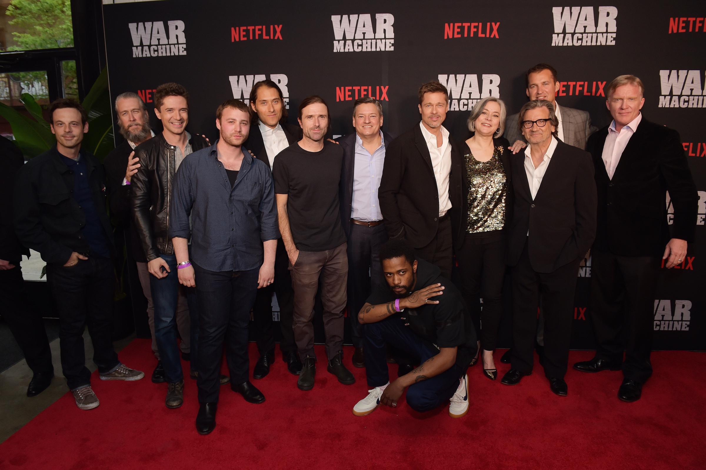 Scoot McNairy, Alan Ruck, Topher Grace, Emory Cohen, Jeremy Kleiner, David Michod, Ted Sarandos, Lakeith Stanfield, Brad Pitt, Meg Tilly, Griffin Dunne, Scott Stuber, and Anthony Michael Hall attend a special screening of "War Machine" on May 16, 2017 | Source: Getty Images