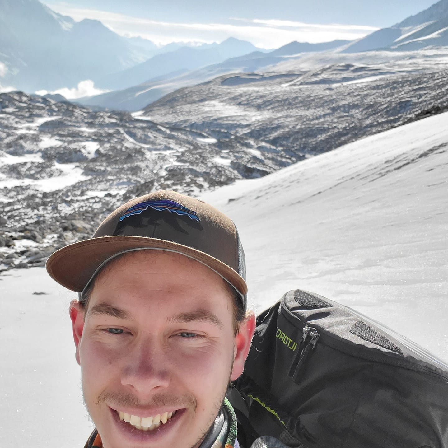 Antoine Forest hikes a snow-covered mountainous area in a post on May 17, 2019 | Source: Facebook/Antoine Forest