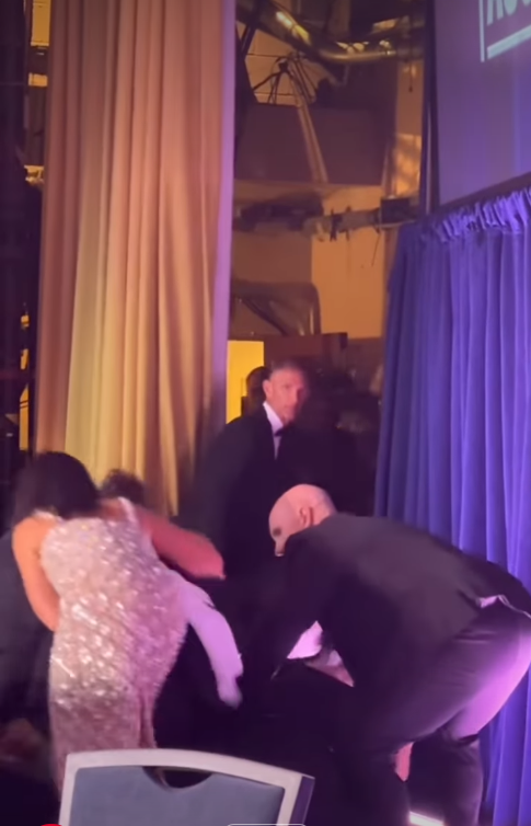 United States Secret Service agents are seen ducking and using their bodies as shields around President Donald Trump, forming a protective barrier as they move to secure him. | Source: Instagram/hellomag