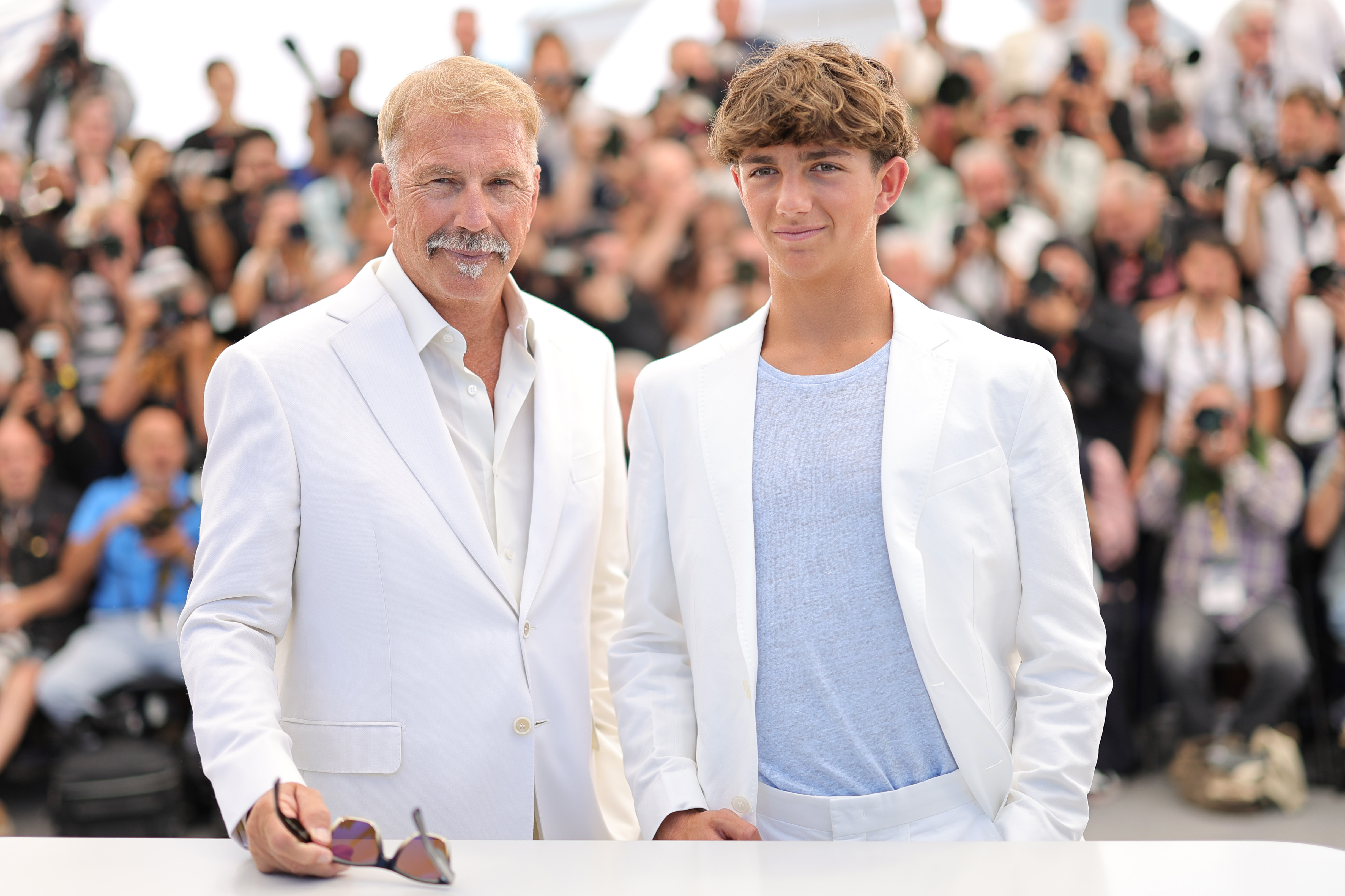Hayes and Kevin Costner attend the "Horizon: An American Saga" Photocall at the 77th annual Cannes Film Festival at Palais des Festivals in Cannes, France, on May 19, 2024 | Source: Getty Images