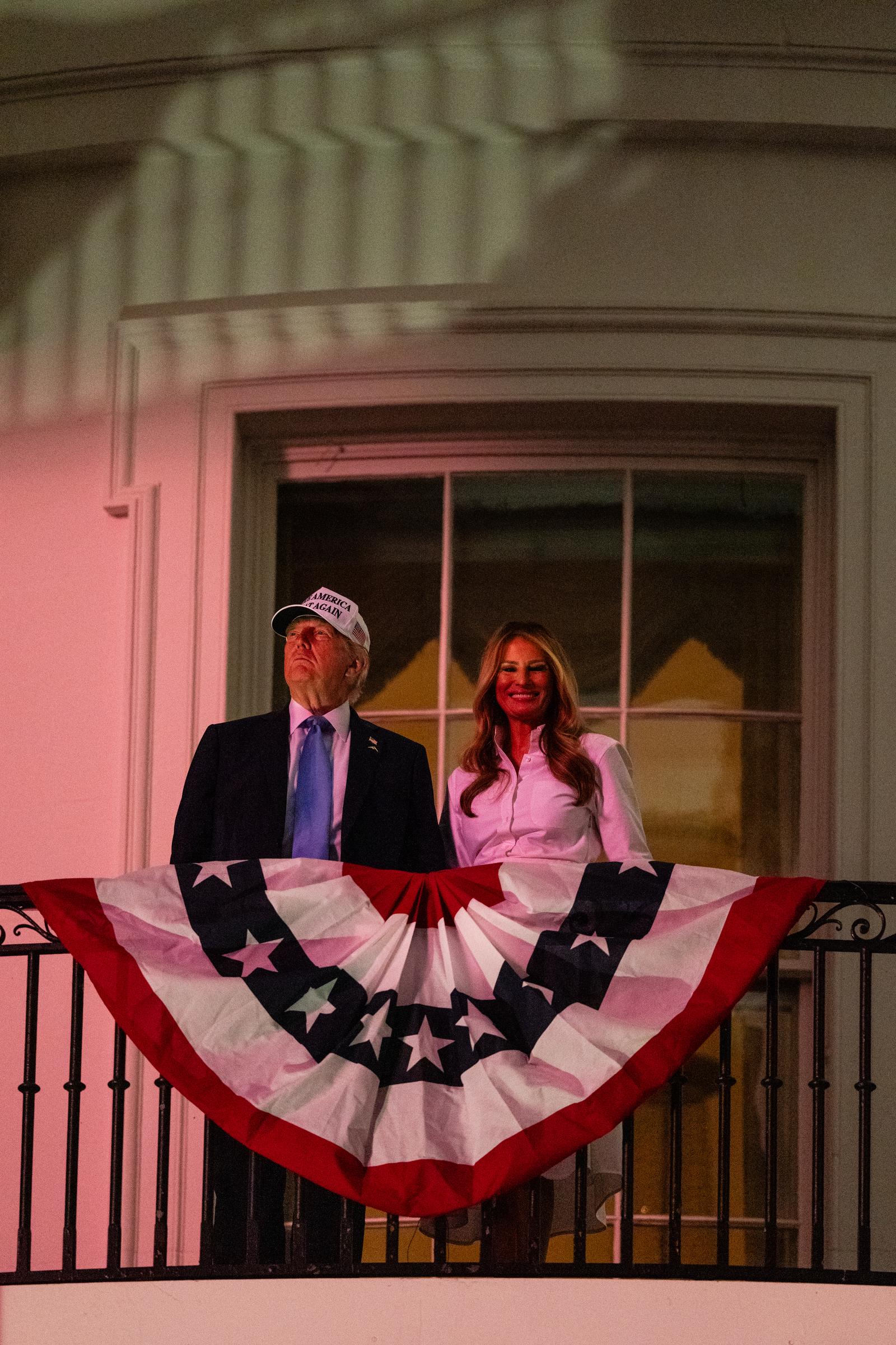 President Donald Trump and First Lady Melania Trump watch fireworks during a Fourth of July celebration at the White House on July 4, 2025 in Washington, DC. | Source: Getty Images