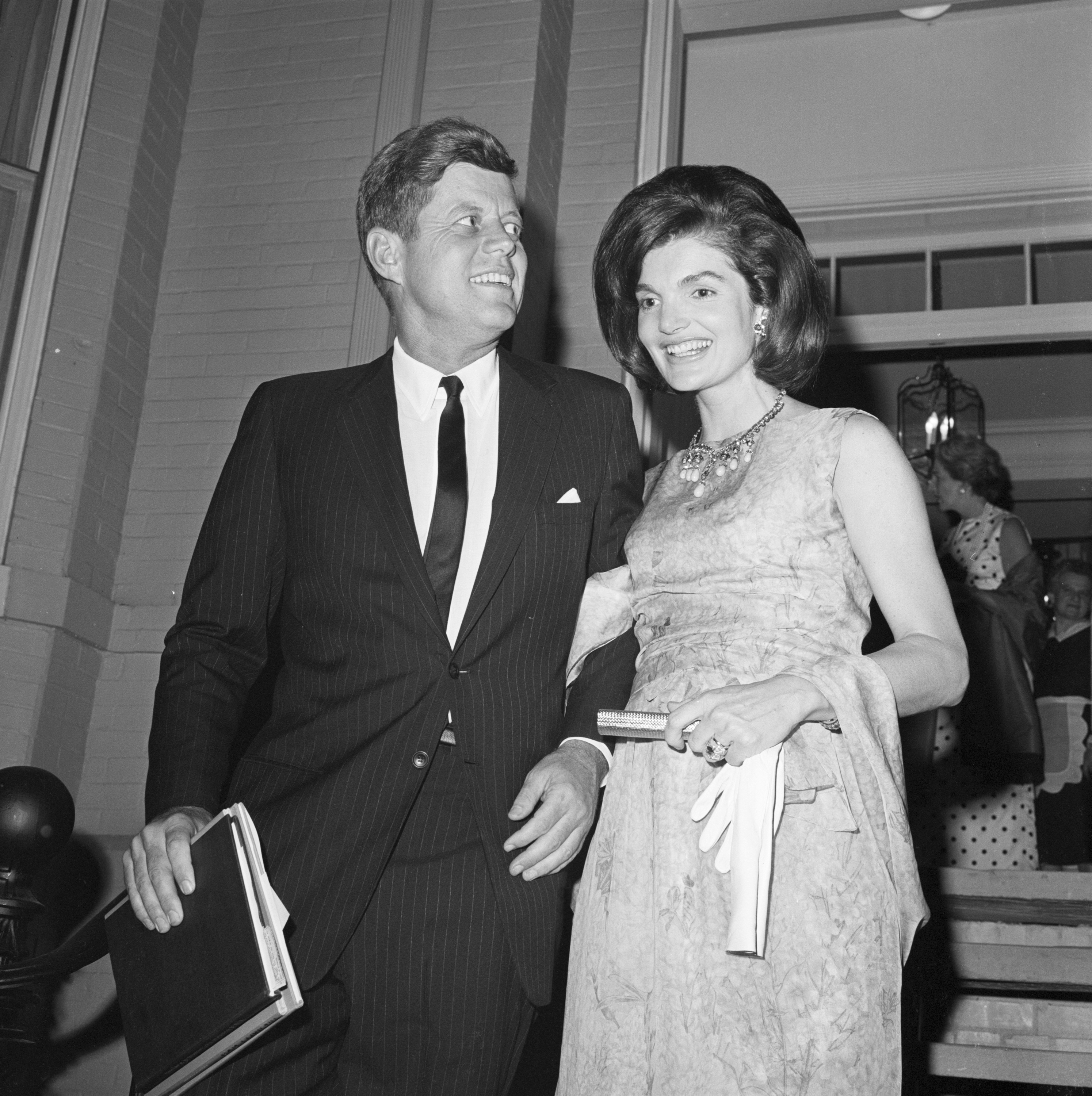 John F. Kennedy and Jacqueline Kennedy Onassis at the National Guard Armory on November 29, 1962. | Source: Getty Images