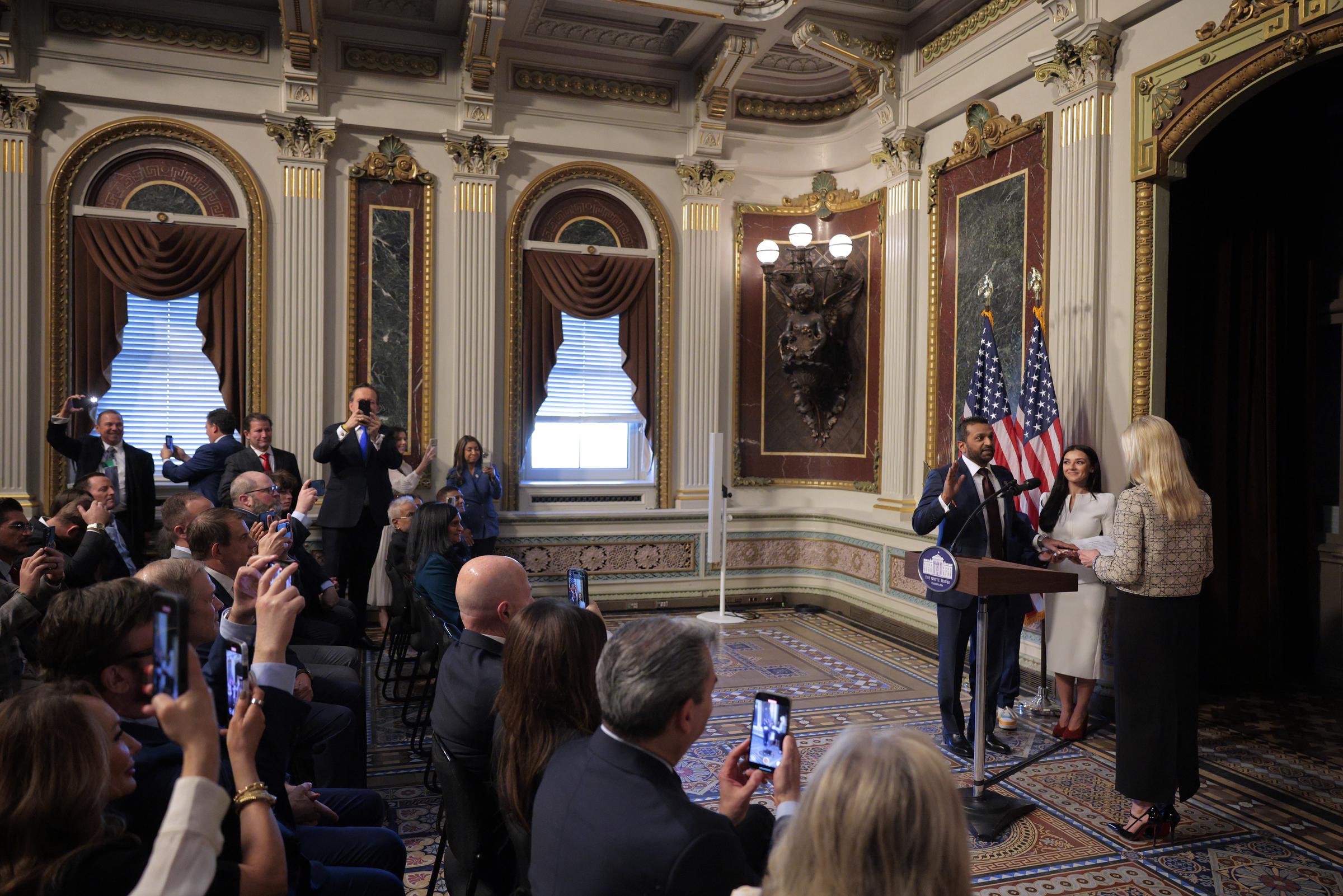 The ceremonial swearing-in took place in the Indian Treaty Room of the Eisenhower Executive Office Building, with guests filling the room and recording the moment on their phones. | Source: Getty Images