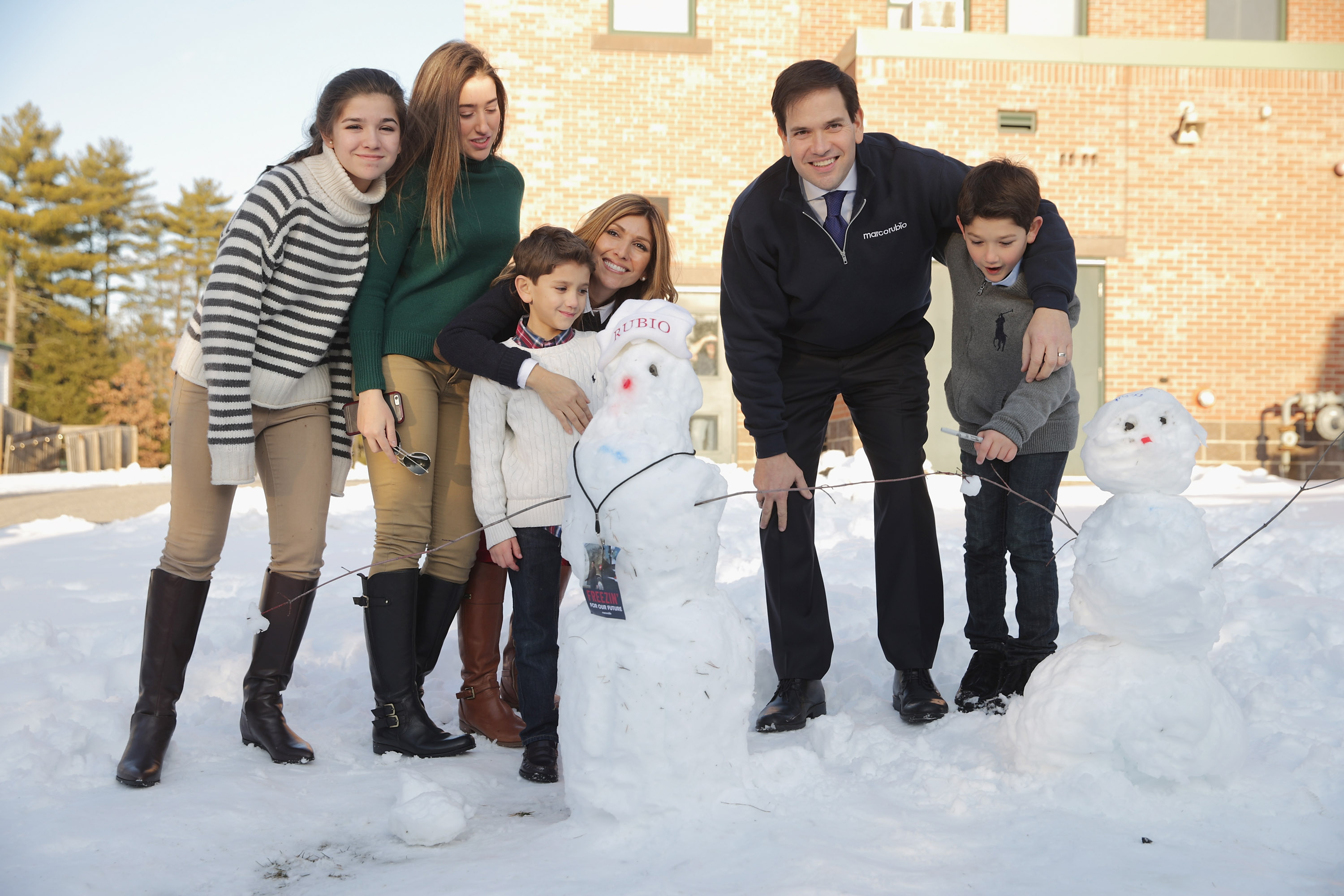 Marco and Jeanette Dousdebes Rubio posing for a family photo with their kids, Daniella, Amanda, Dominick, and Anthony Rubio, ahead of the New Hampshire Primary in Hudson on February 7, 2016. | Source: Getty Images