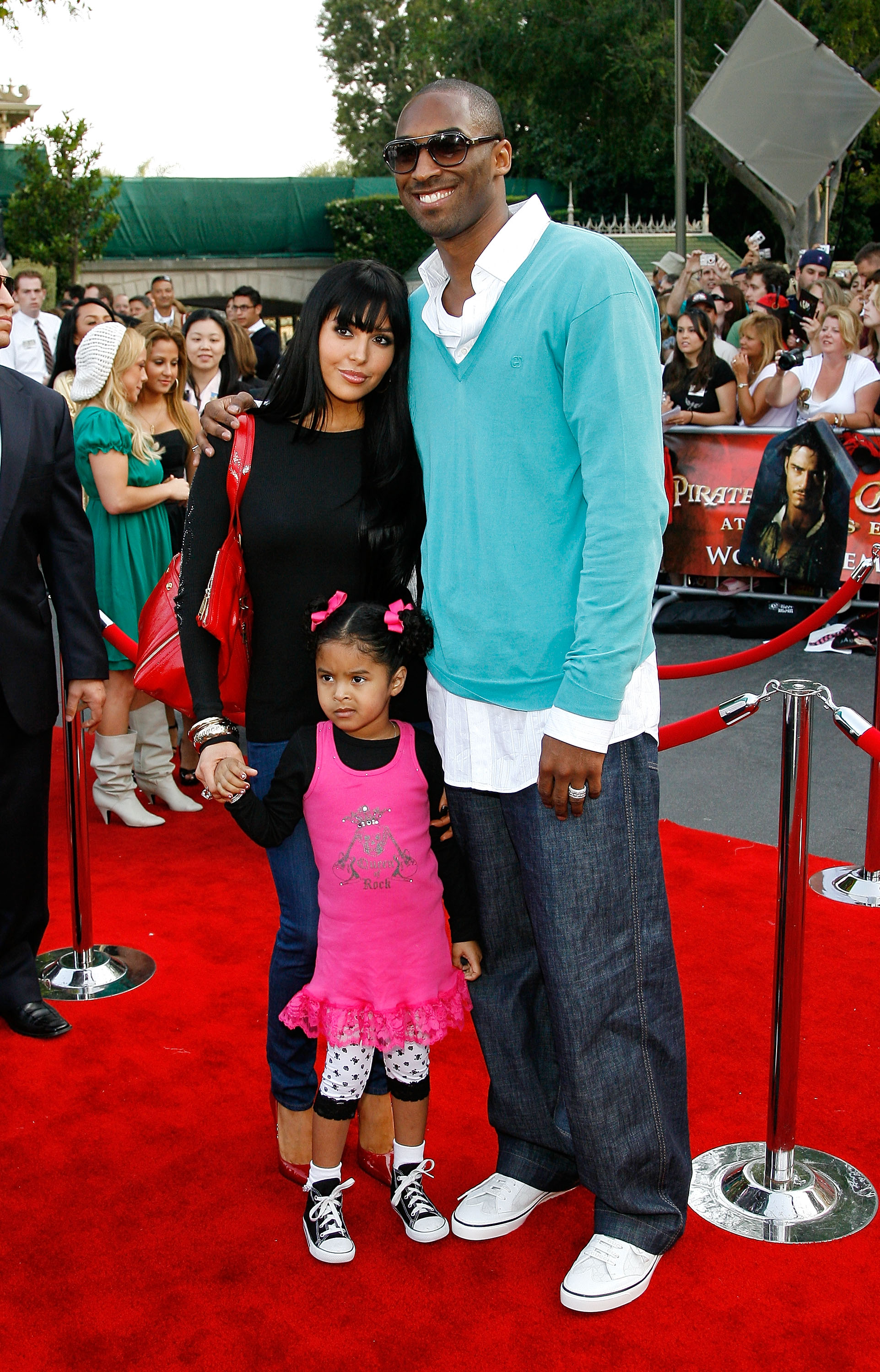 Kobe Bryant poses alongside wife Vanessa Bryant and their daughter, Natalia Diamante Bryant, at the Disneyland premiere of “Pirates of the Caribbean: At World's End,” with the family gathered on the red carpet for the special event.