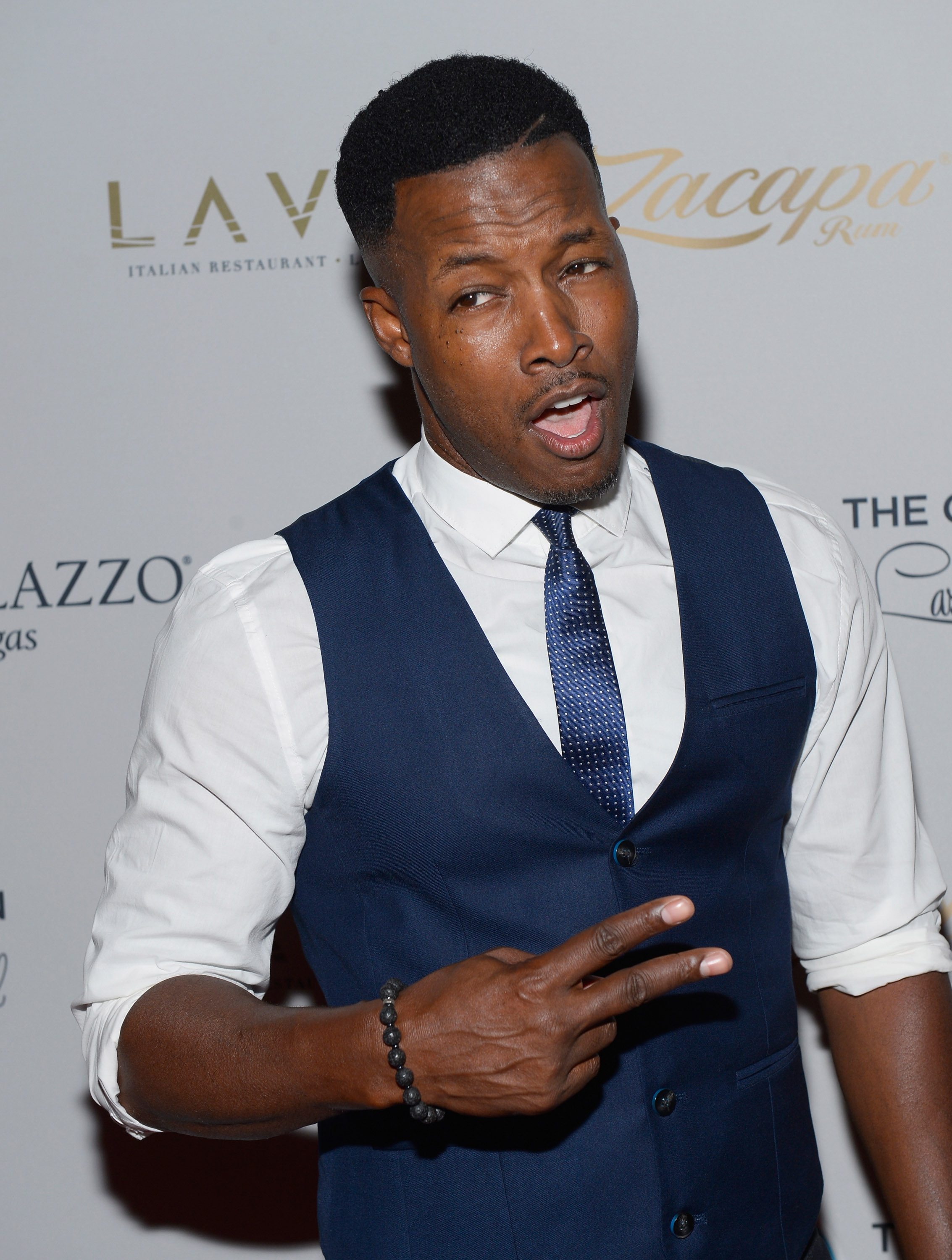Flex Alexander at the 2nd Annual Coach Woodson Las Vegas Invitational pairings party in Las Vegas, Nevada on July 12, 2015. | Source: Getty Images