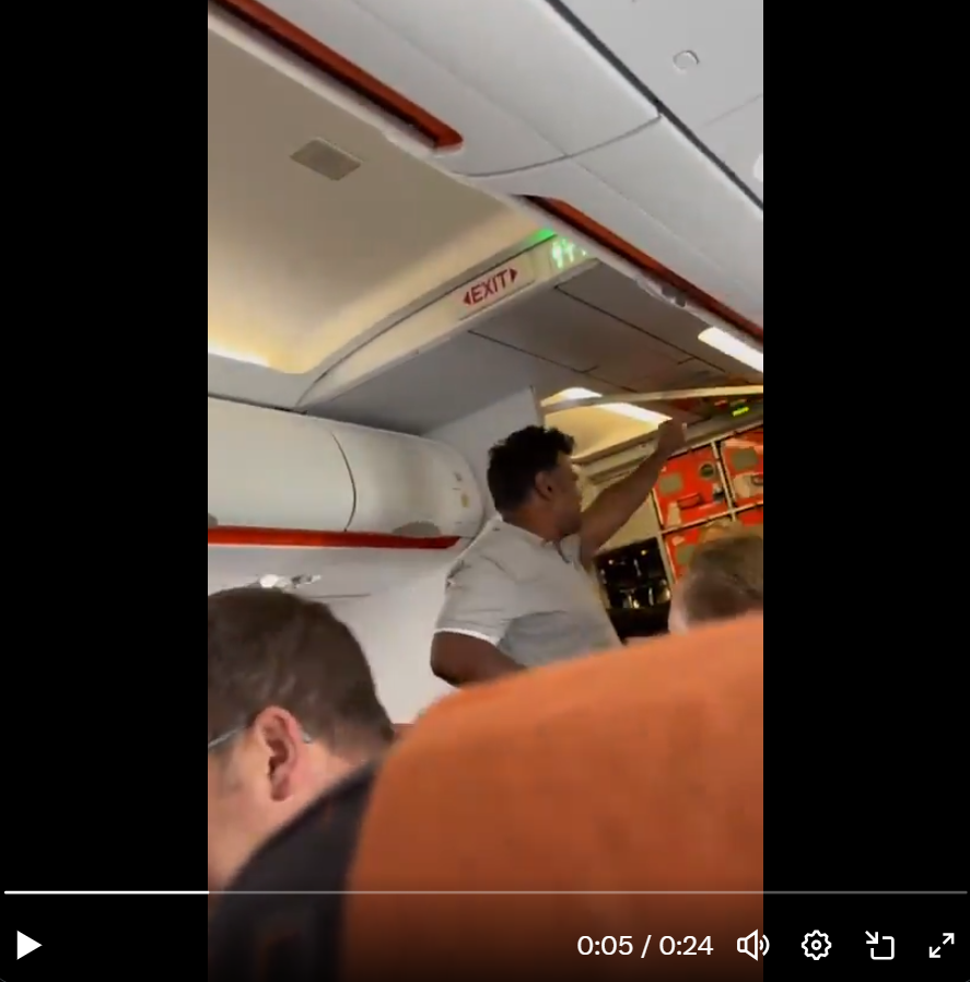 Man pumping his fist and shouting in an EasyJet flight from Luton to Glasgow on July 27, 2025. | Source: x.com/nyssa7