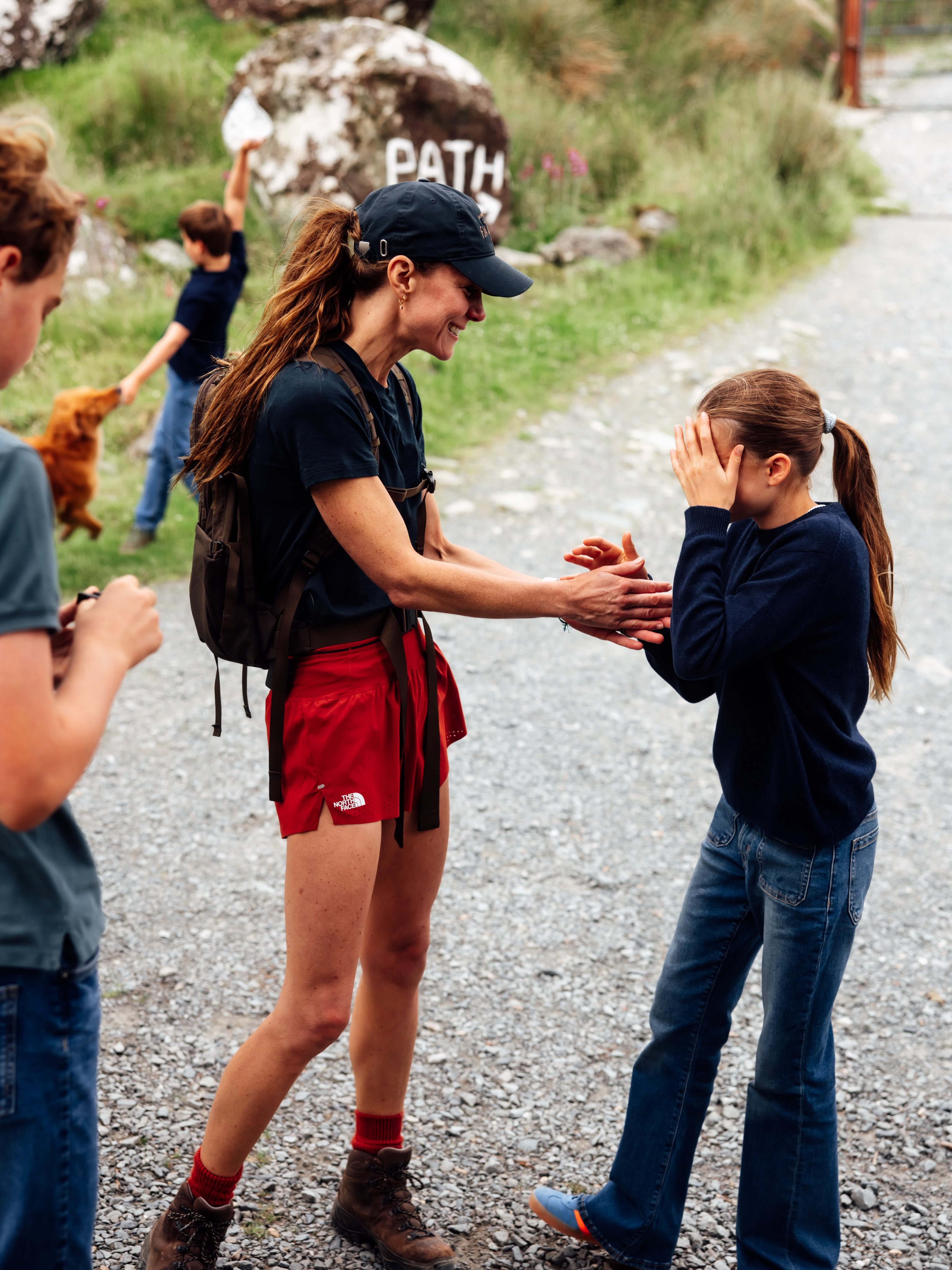 Kate's milestone challenge was the official reason for the post, but the relaxed family images gave fans plenty of smaller details to discuss. Her sporty outfit, especially the shorts, also became part of the conversation. | Source: Instagram/princeandprincessofwales