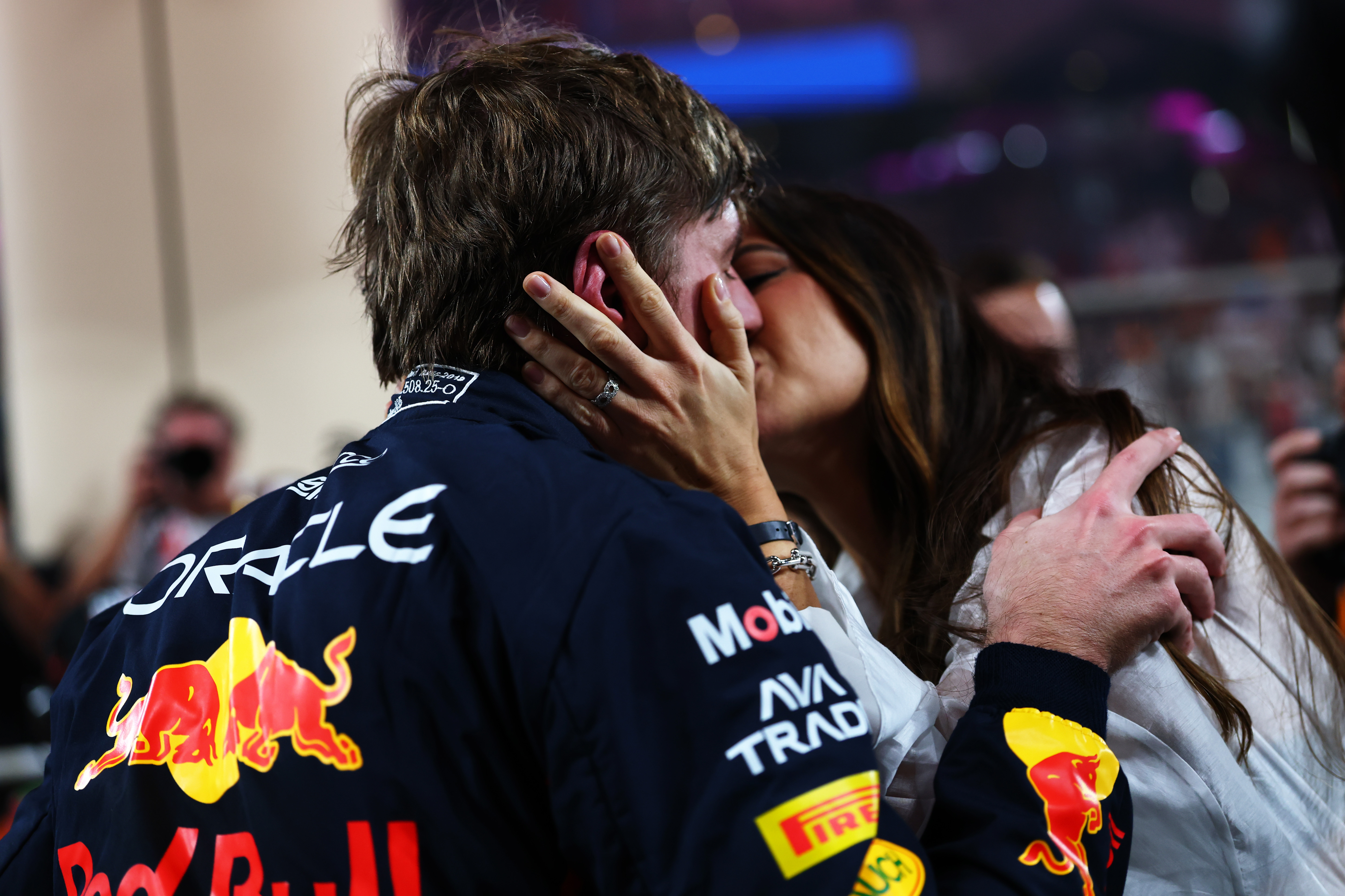 Another angle captures the couple still seen sharing a kiss of celebration, with this tight shot focusing intently on their passion and embrace following the successful qualifying session.