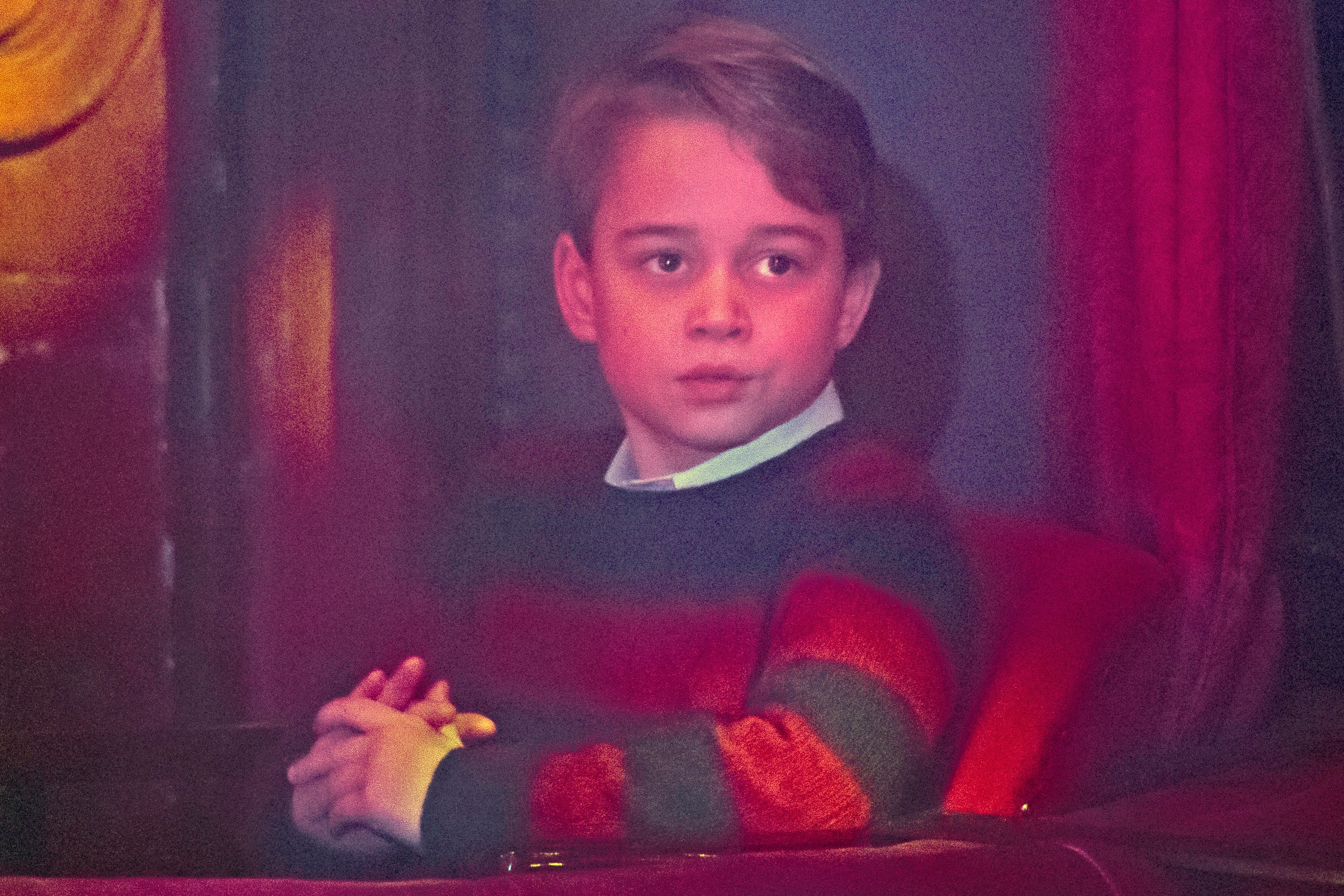 At 7, George attended a special pantomime performance at the London Palladium on Dec. 11 honoring key workers and their families during the pandemic. Six years before his Eton debut, the appearance captures another stage in the childhood that viewers have watched unfold year by year.