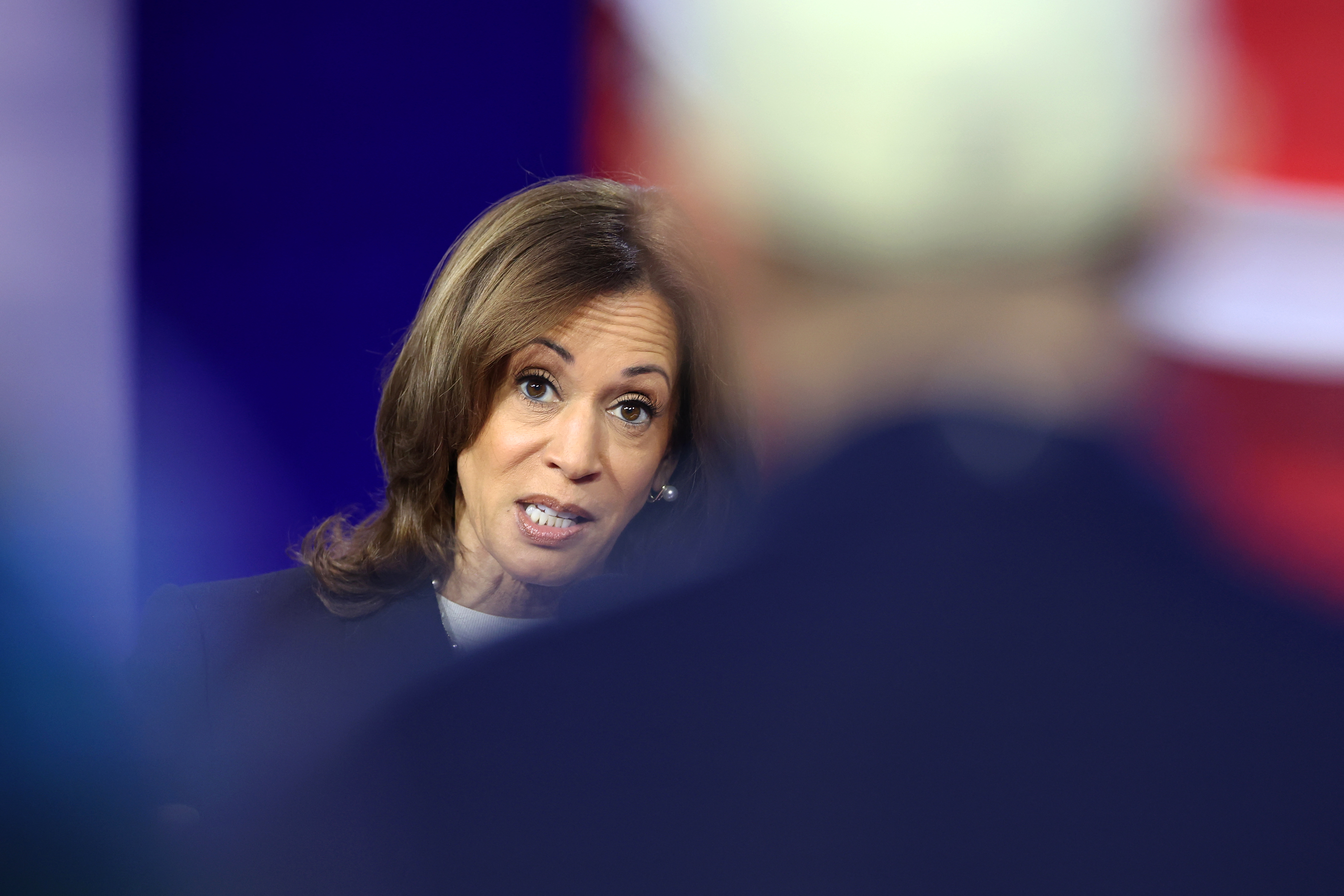Kamala Harris talks with CNN moderator Anderson Cooper during a Presidential Town Hall event at Sun Center Studios in Aston, Pennsylvania, on October 23, 2024 | Source: Getty Images