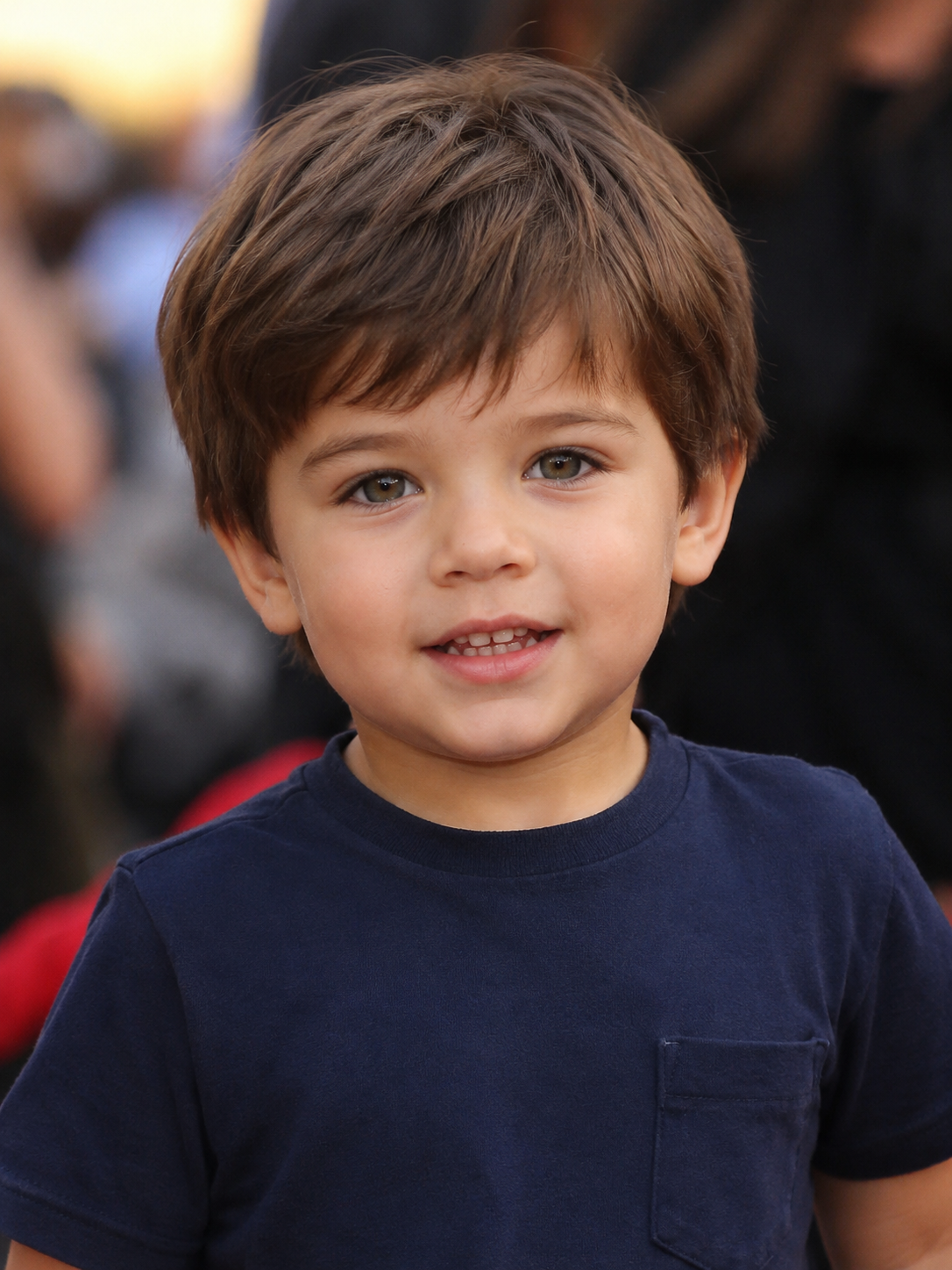 AI visualization of a young boy imagined as a possible son of Katie Holmes and Tom Cruise during early childhood. | Source: ChatGPT
