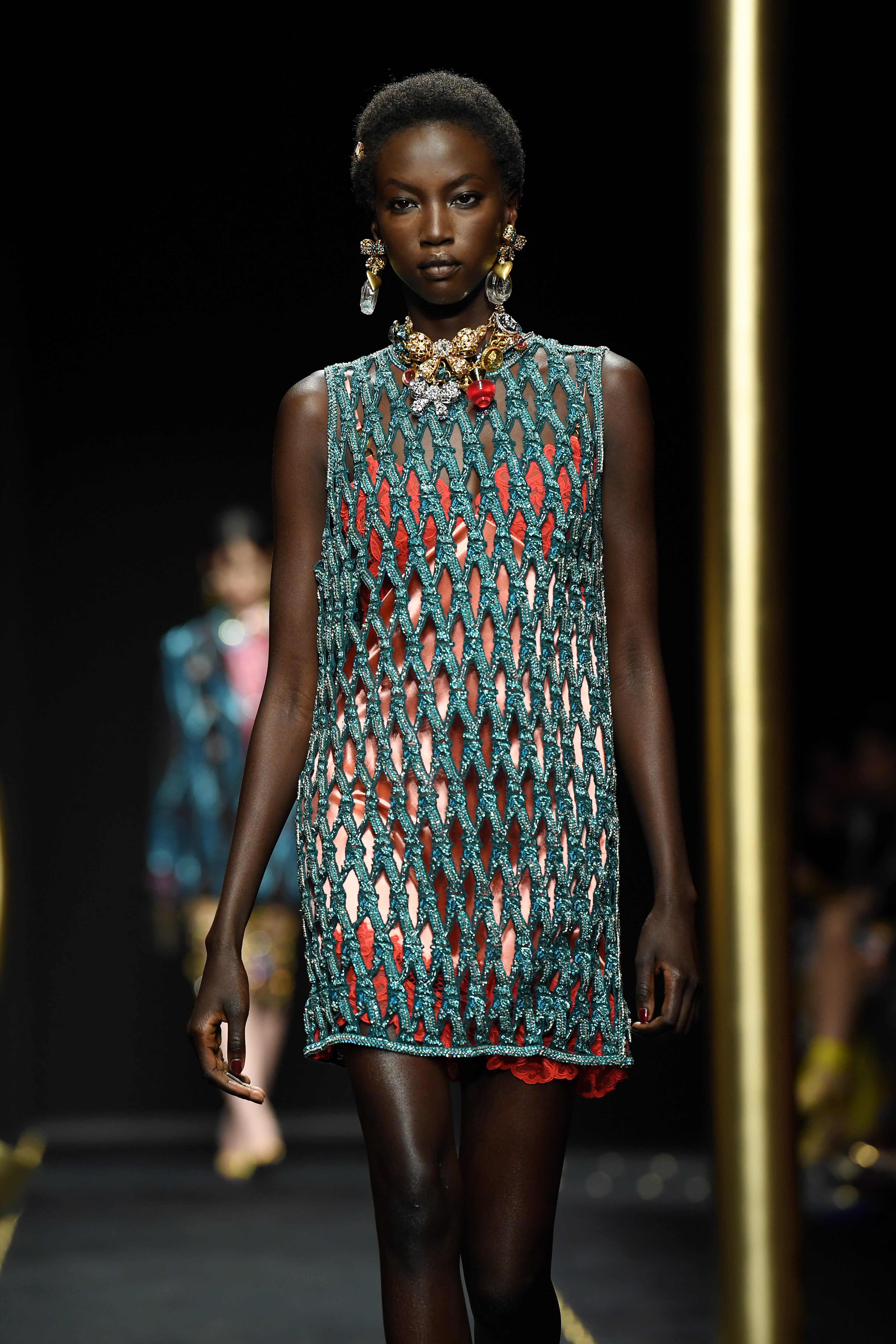 Anok Yai walks the runway at the Versace show during Milan Fashion Week in Milan, Italy, on February 22, 2019 | Source: Getty Images