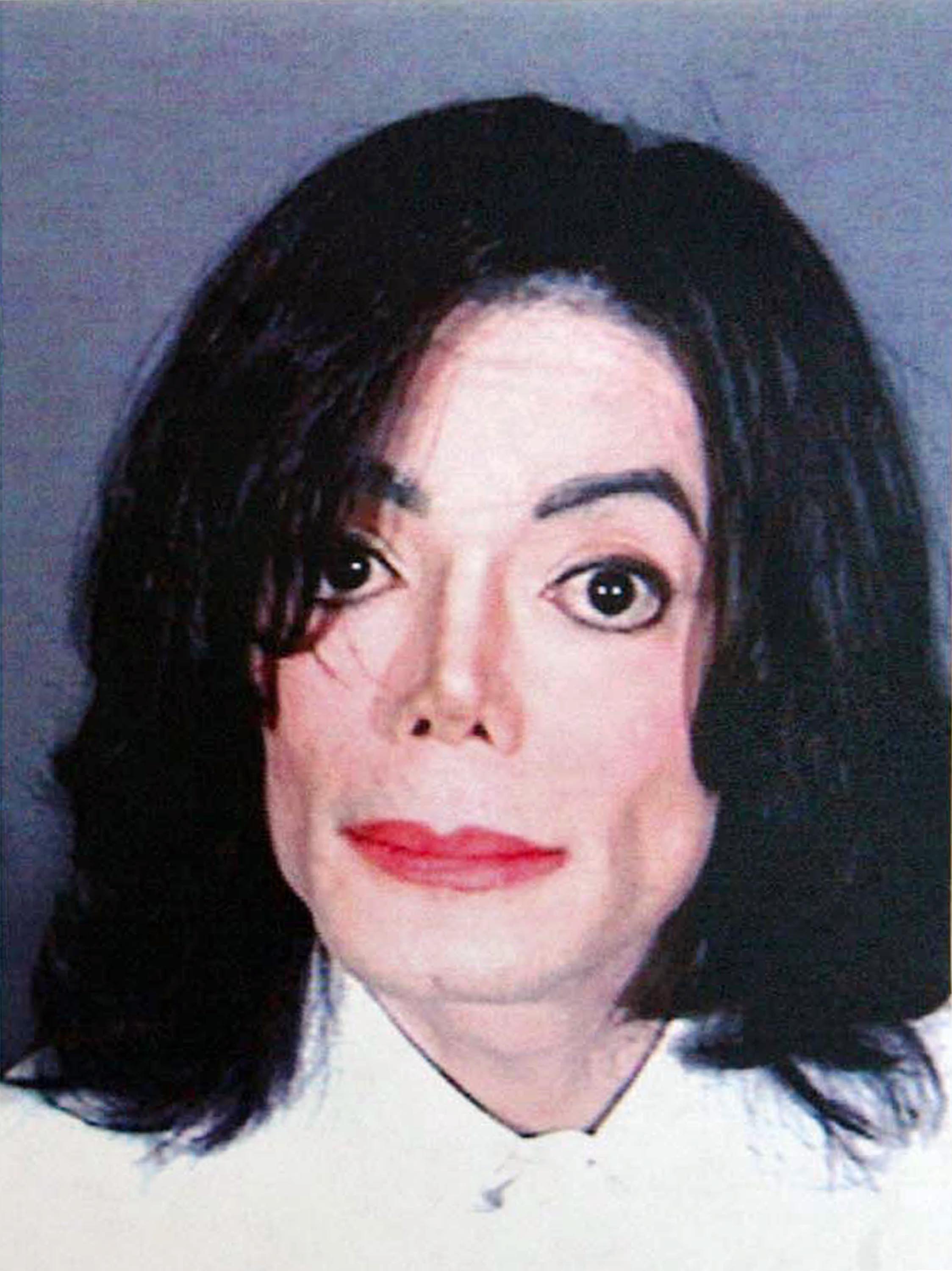 Michael Jackson's mugshot taken in Santa Barbara, California on November 20, 2003. | Source: Getty Images