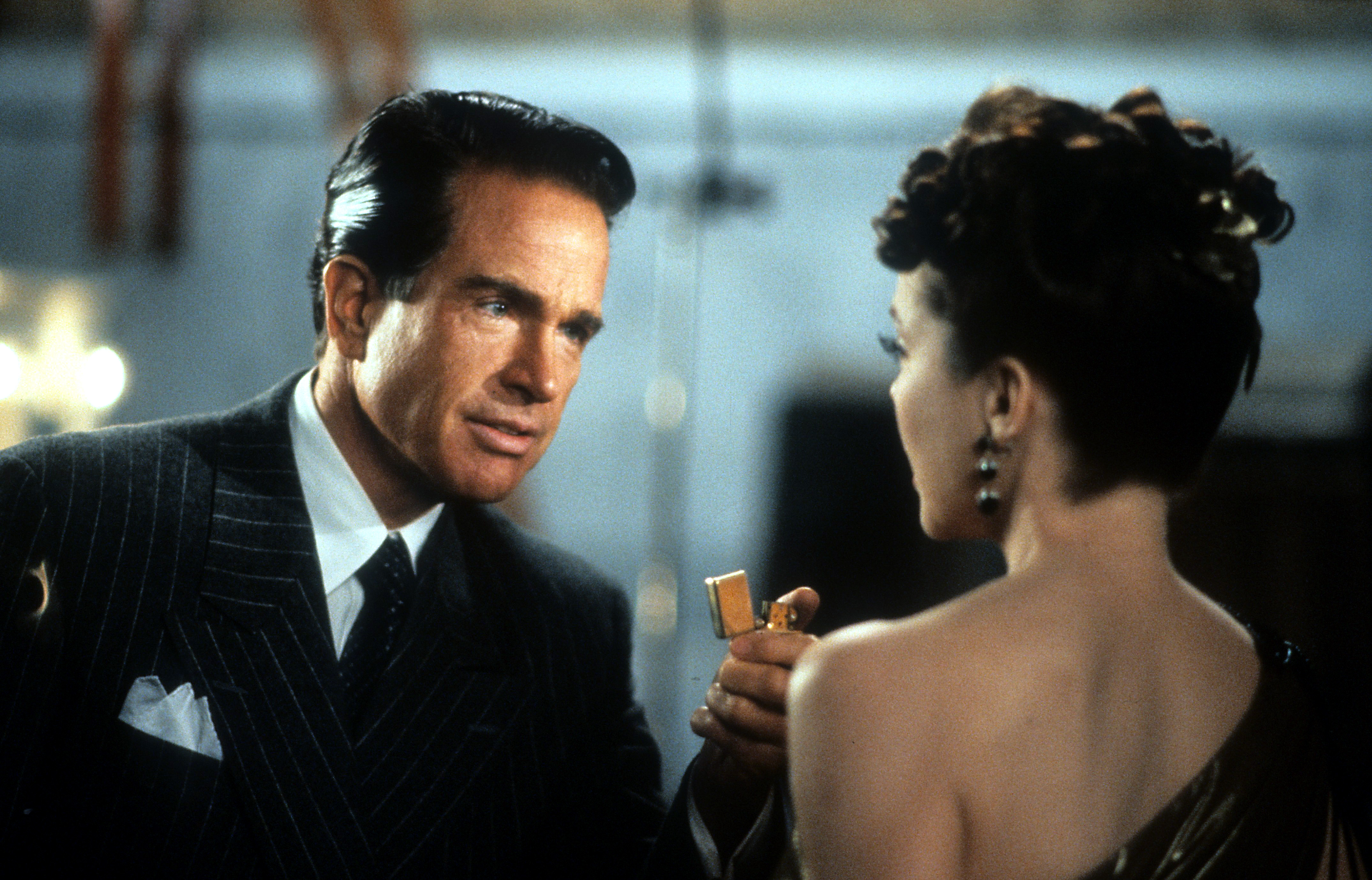 Warren Beatty and Annette Bening in a scene from the film "Bugsy" in 1991 | Source: Getty Images