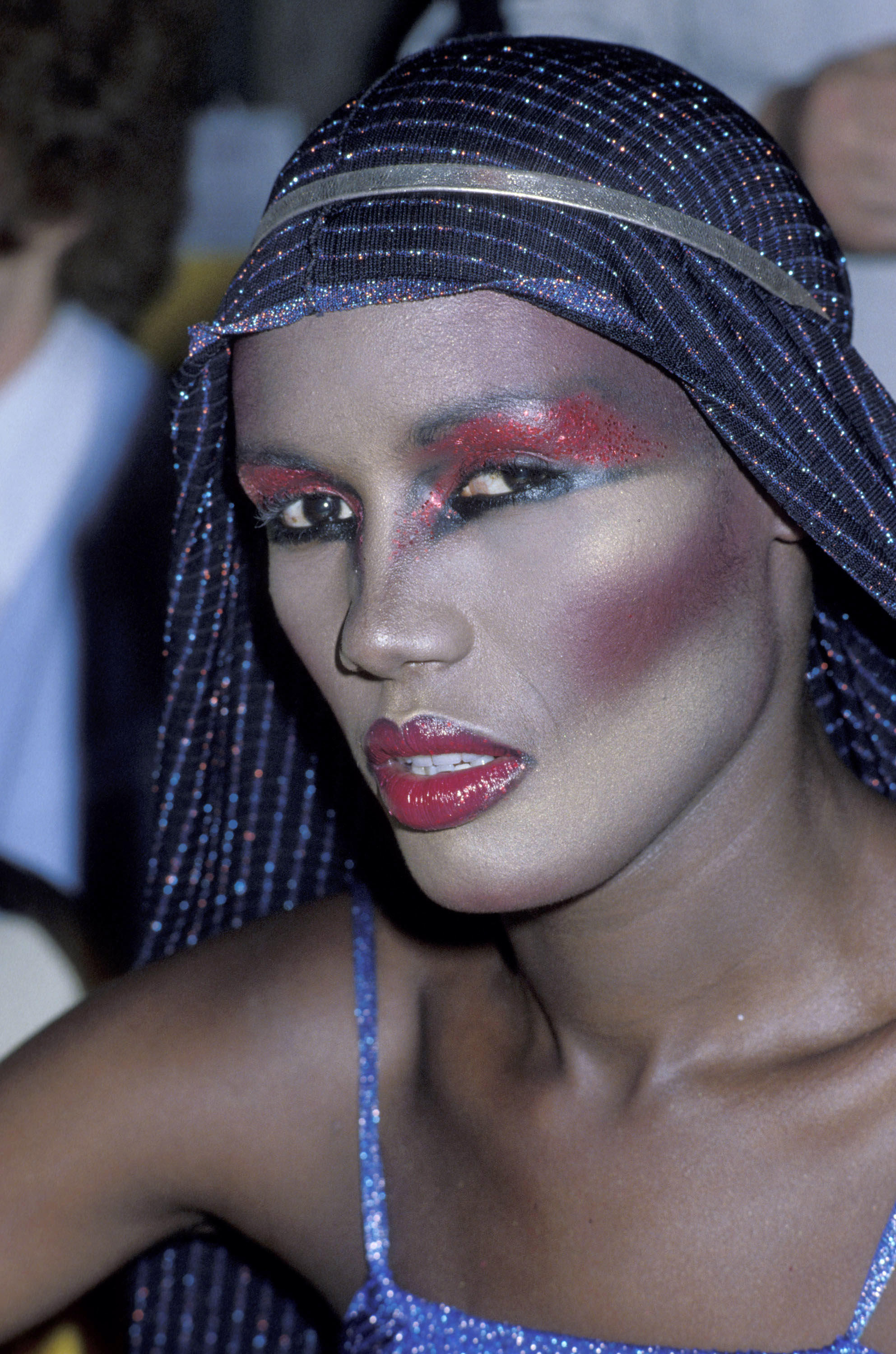 Grace Jones posing for a camera at the Disco Convention Banquet circa late 70s. | Source: Getty Images